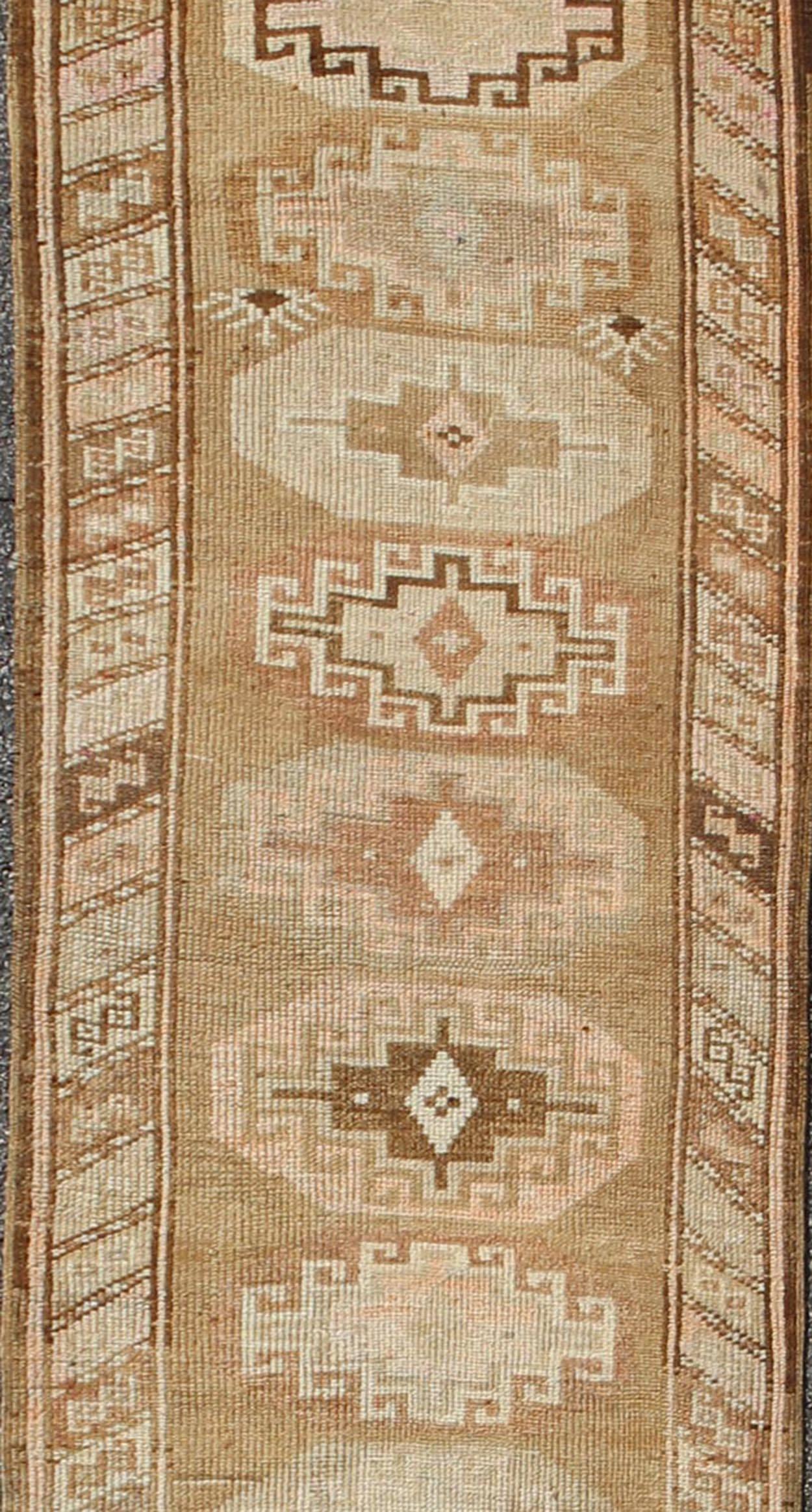 Hand-Knotted Long Vintage Turkish Runner with Taupe, Cream, Brown Stacked Medallions For Sale