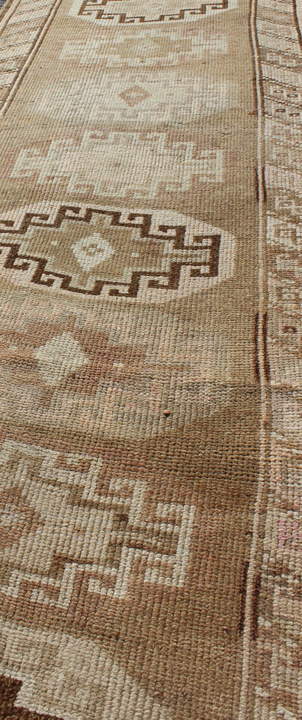 Long Vintage Turkish Runner with Taupe, Cream, Brown Stacked Medallions In Excellent Condition For Sale In Atlanta, GA