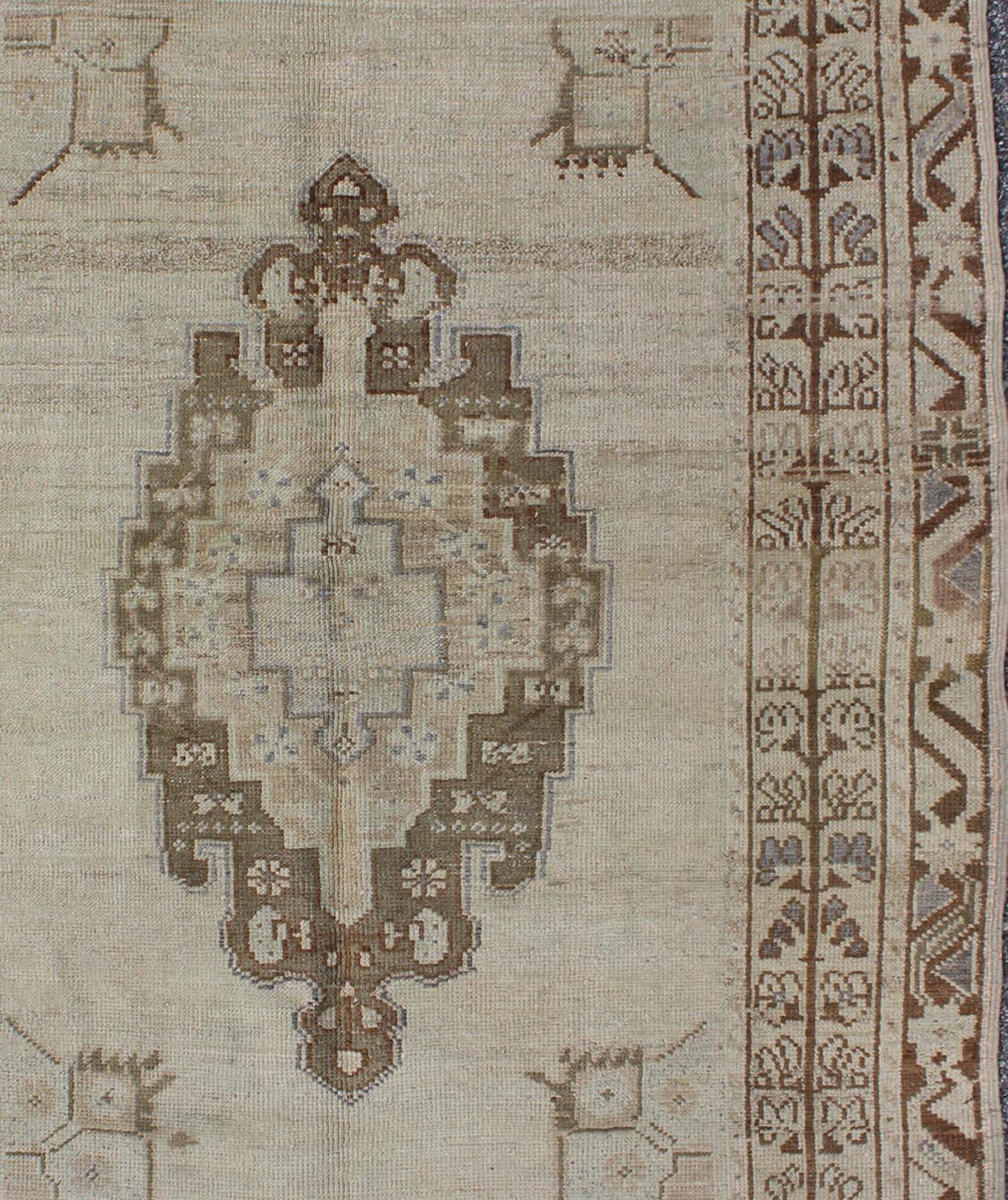 Brown and Taupe Colored Vintage Turkish Oushak Rug with Medallion Design In Good Condition For Sale In Atlanta, GA