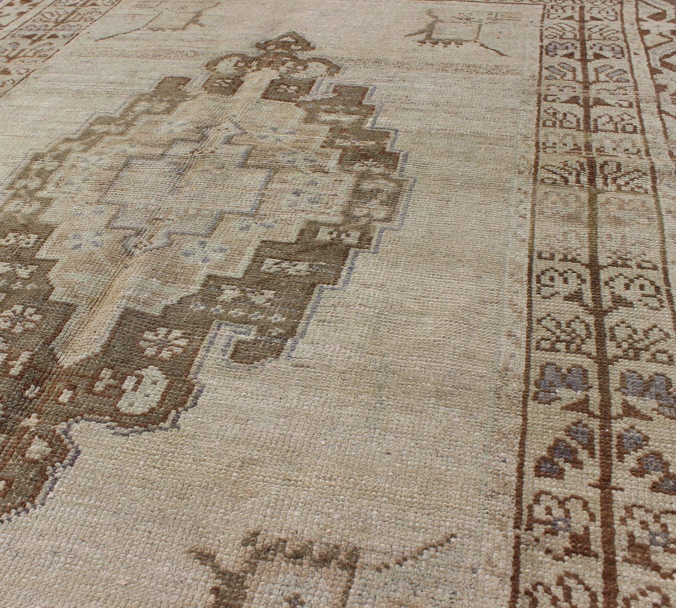 Mid-20th Century Brown and Taupe Colored Vintage Turkish Oushak Rug with Medallion Design For Sale
