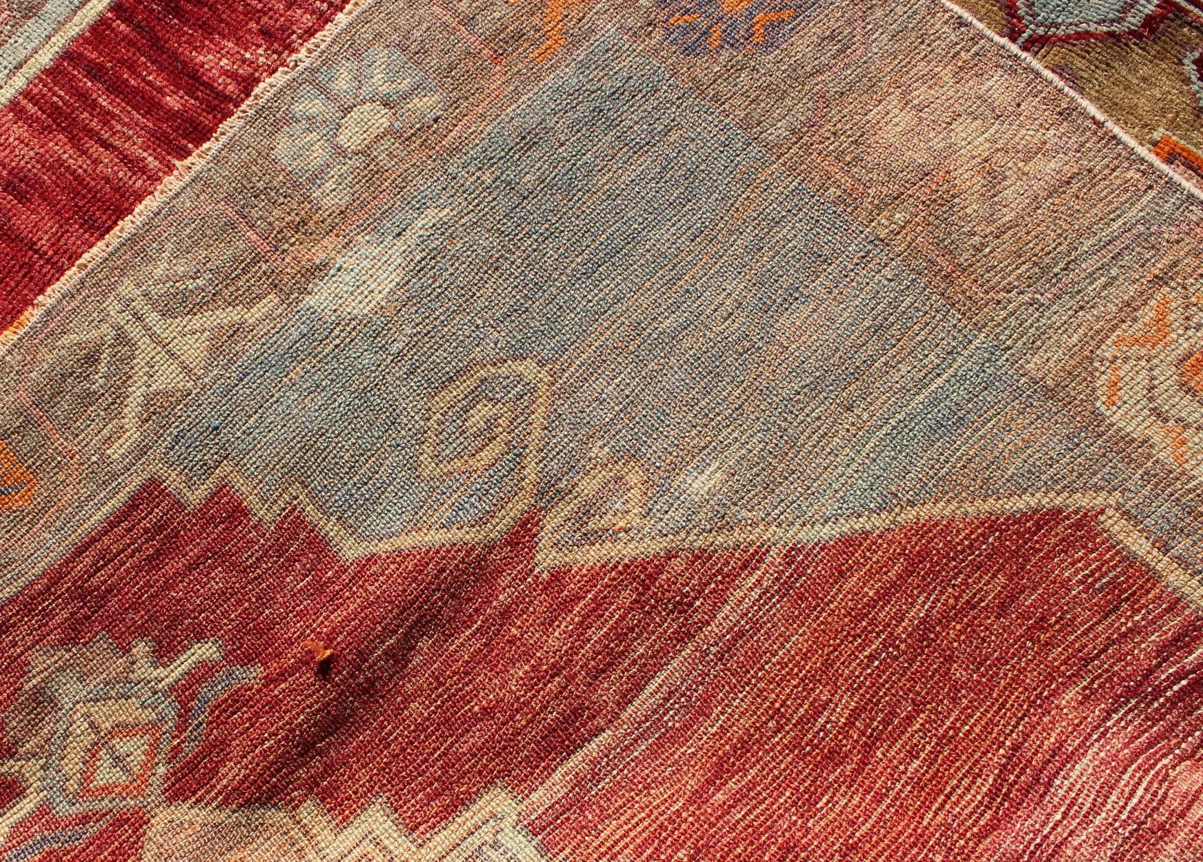 Mid-20th Century Vintage Turkish Oushak Rug with Tribal Medallion in Deep Red and Multi-Color