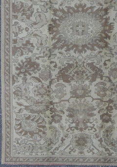 Muted Turkish Oushak Rug Featuring Soft Taupe, Faded Sage, and Pale Gray