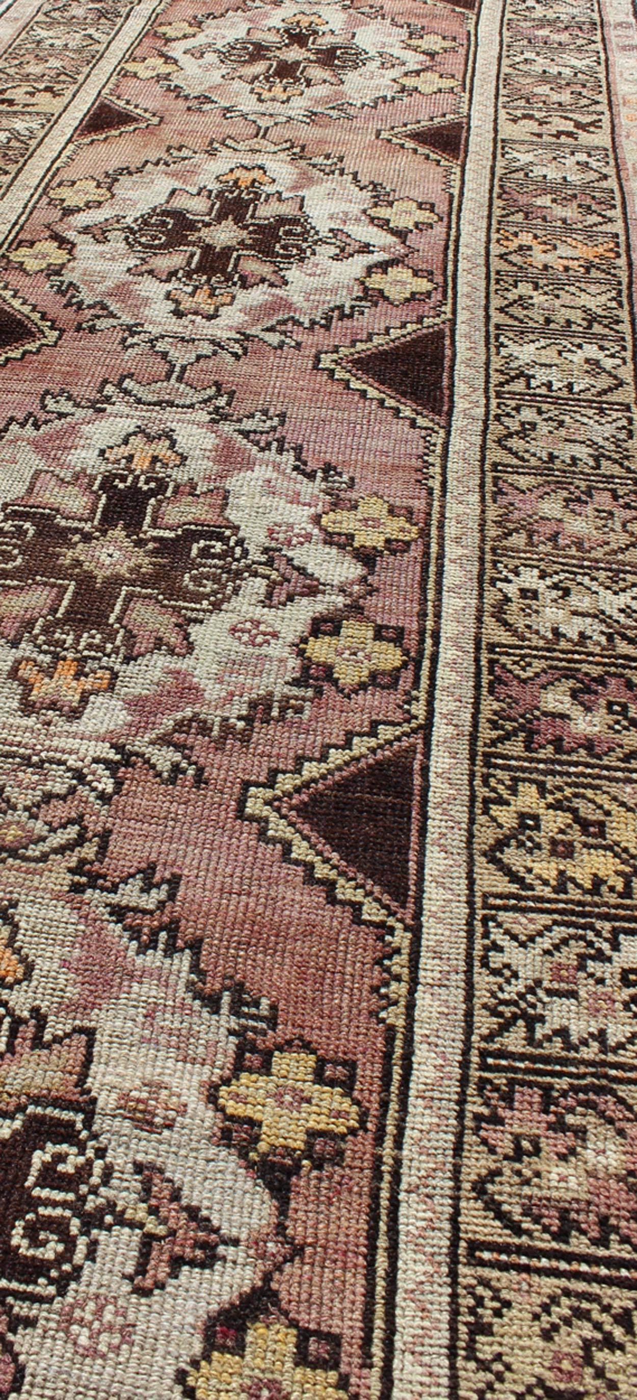 Mid-20th Century Vintage Turkish Oushak Runner with Floral Medallions in Brown Lavender and Taupe For Sale