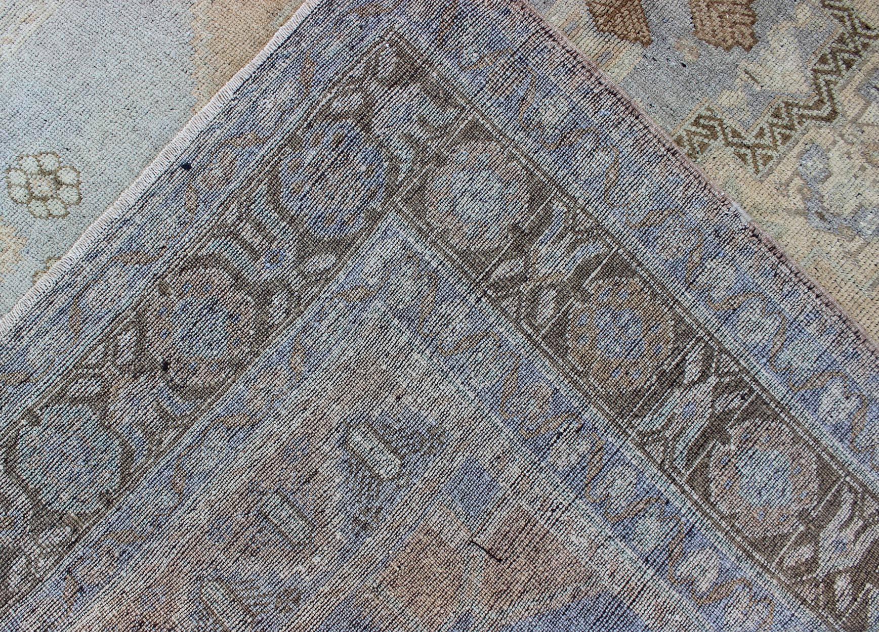 Mid-20th Century Periwinkle Blue and Tan Vintage Turkish Oushak Rug with Layered Medallion For Sale