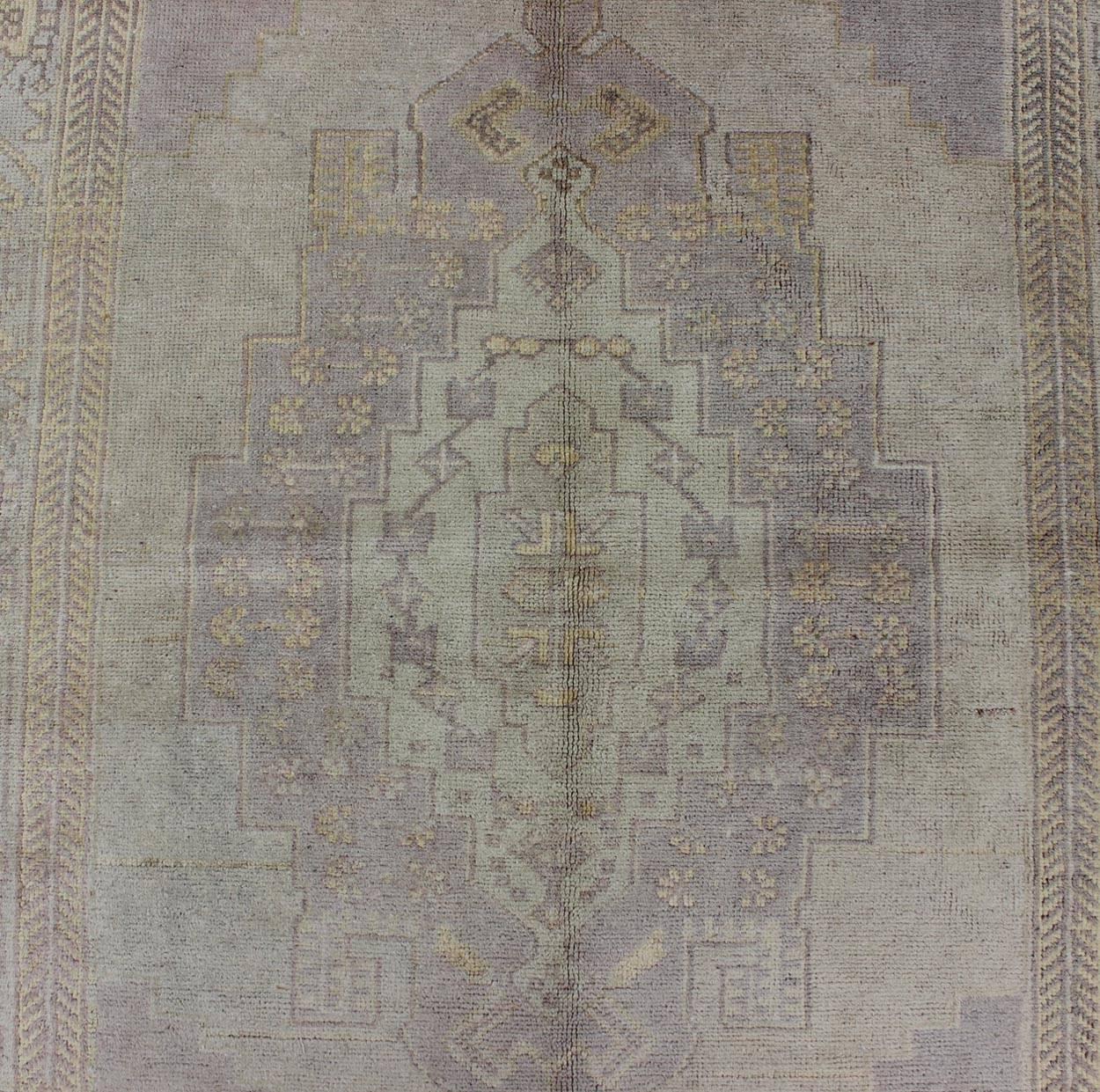 Wool Muted Vintage Turkish Oushak Rug with Medallion Geometric Design For Sale