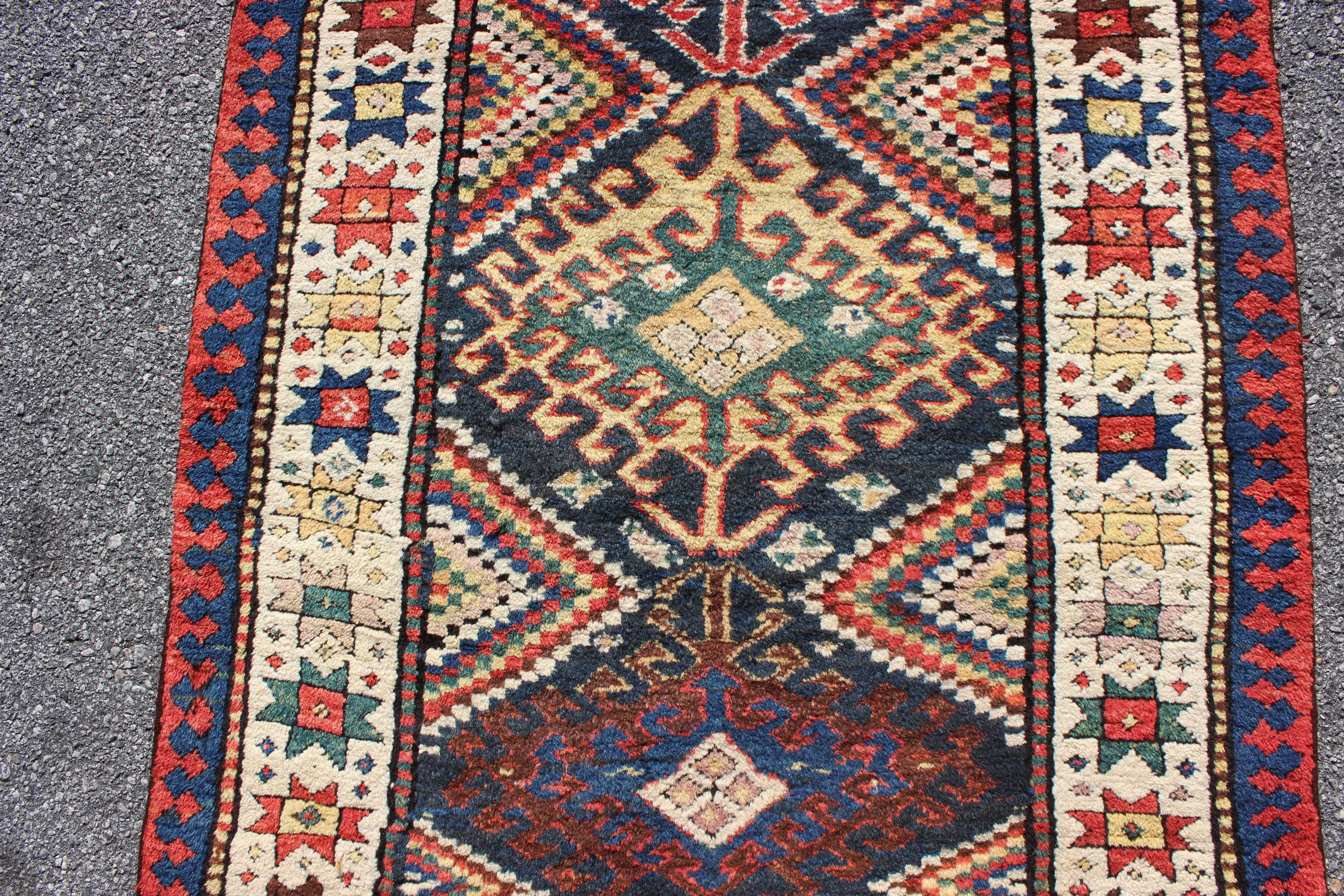 Hand-Knotted Multicolored Antique Caucasian Kazak Runner with Hooked Latch's and Star Motifs