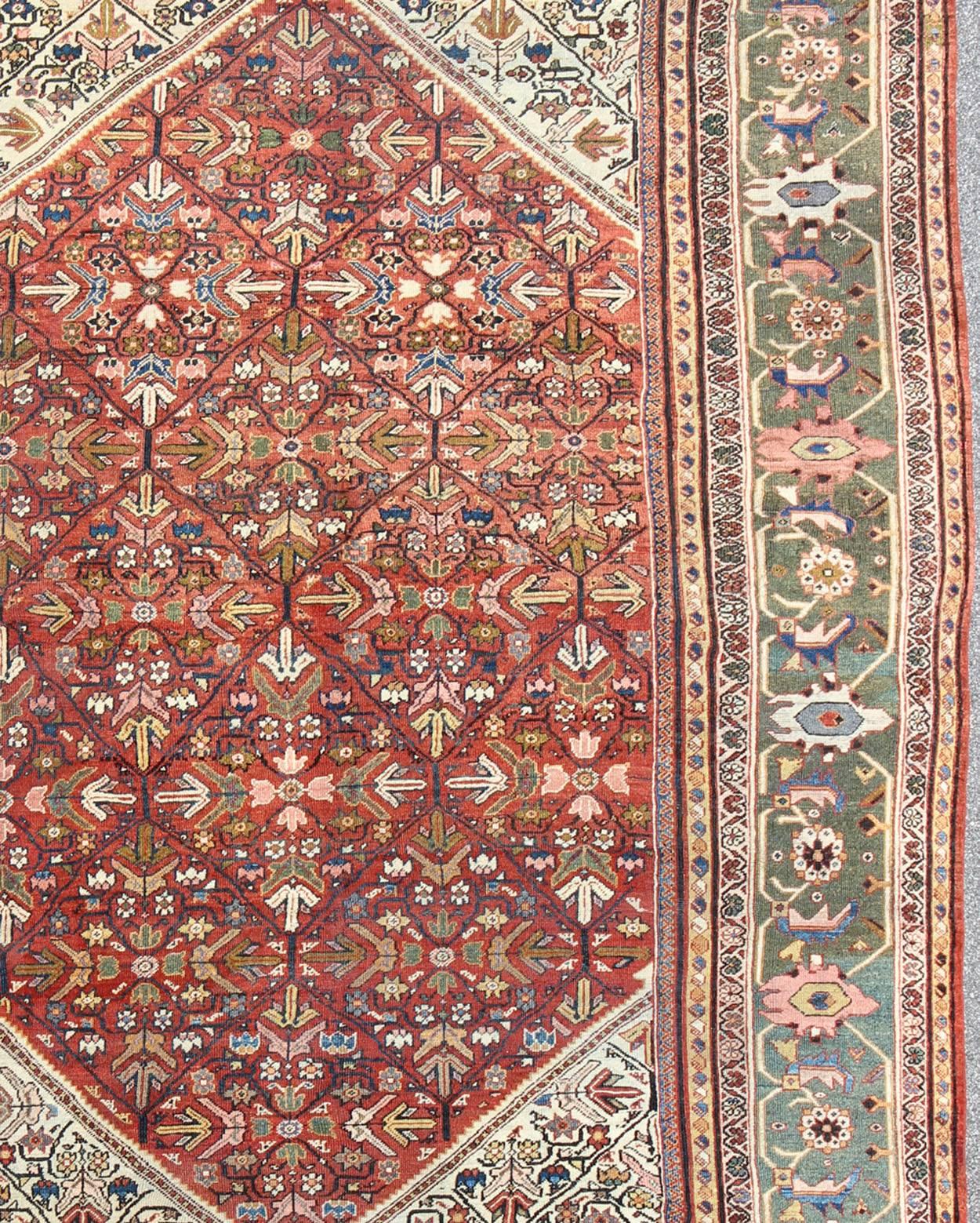 20th Century Antique Persian Sultanabad Rug in Terracotta Red Background and Green Border For Sale