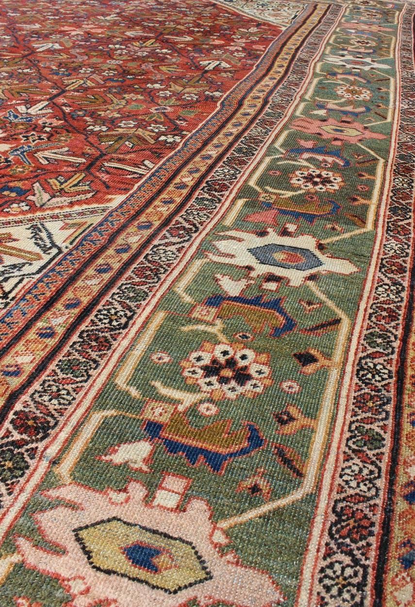 Wool Antique Persian Sultanabad Rug in Terracotta Red Background and Green Border For Sale
