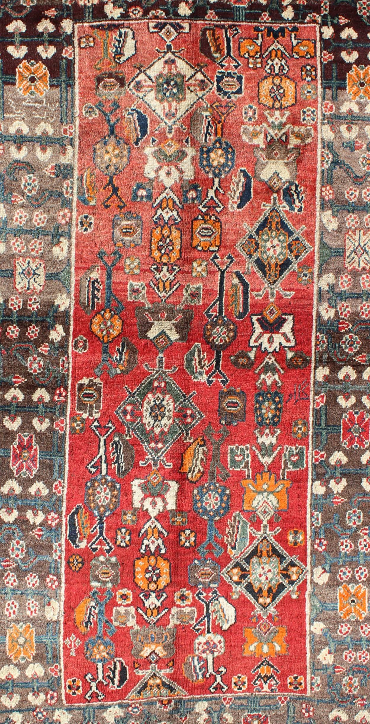 Tribal Red Background Shiraz Persian Rug with Sub-Geometric Motifs Throughout