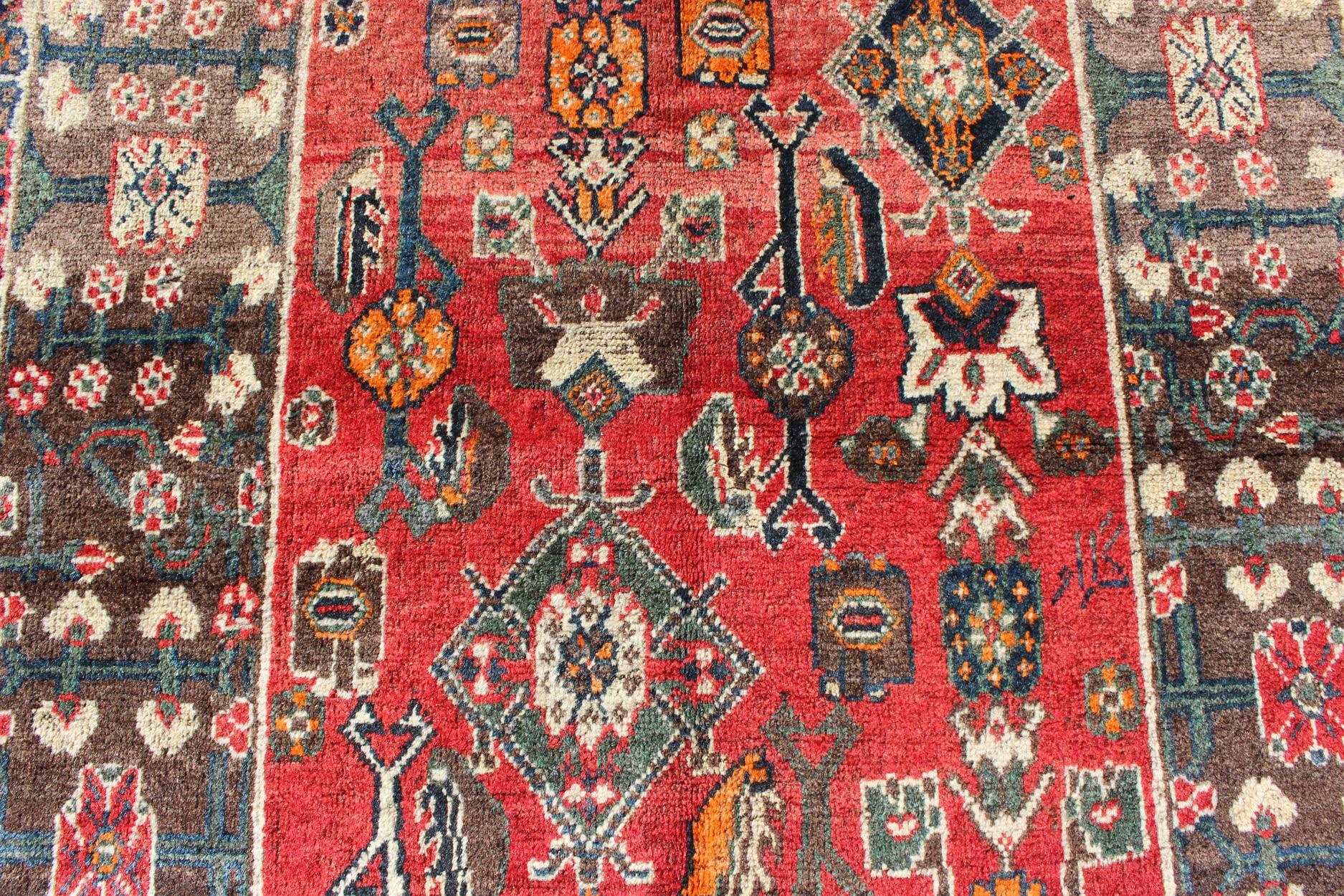 Mid-20th Century Red Background Shiraz Persian Rug with Sub-Geometric Motifs Throughout