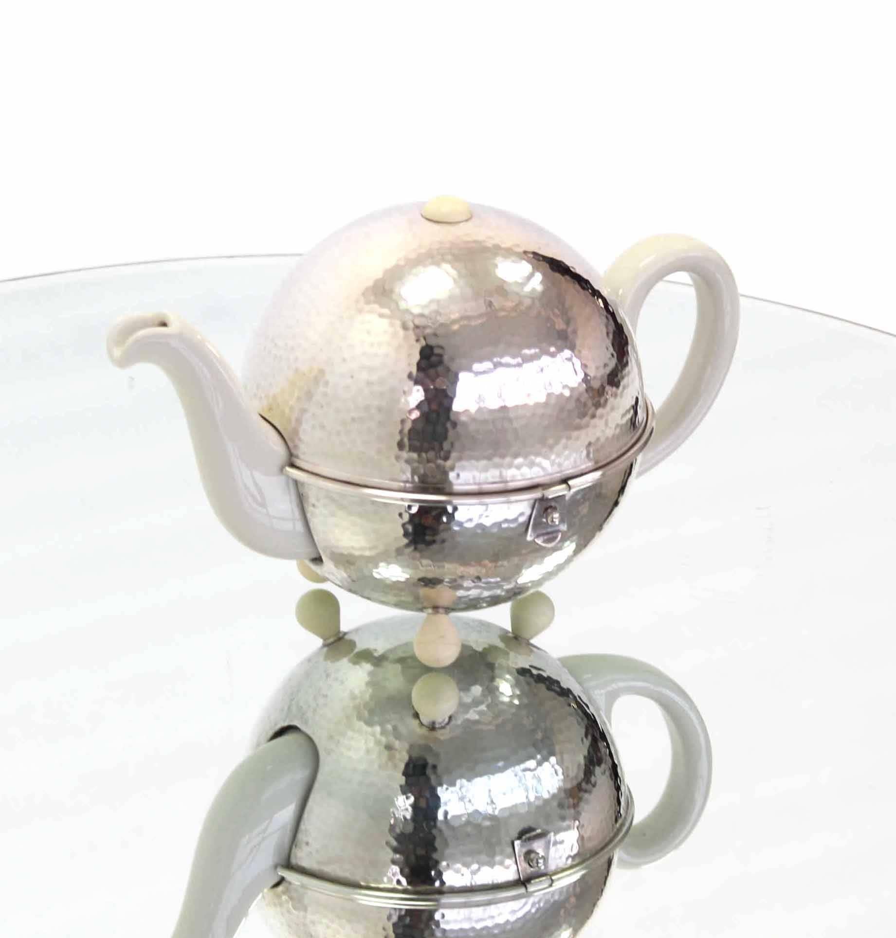 American WMF Porcelain Tea Pot in Hammered Metal Insulated Cover