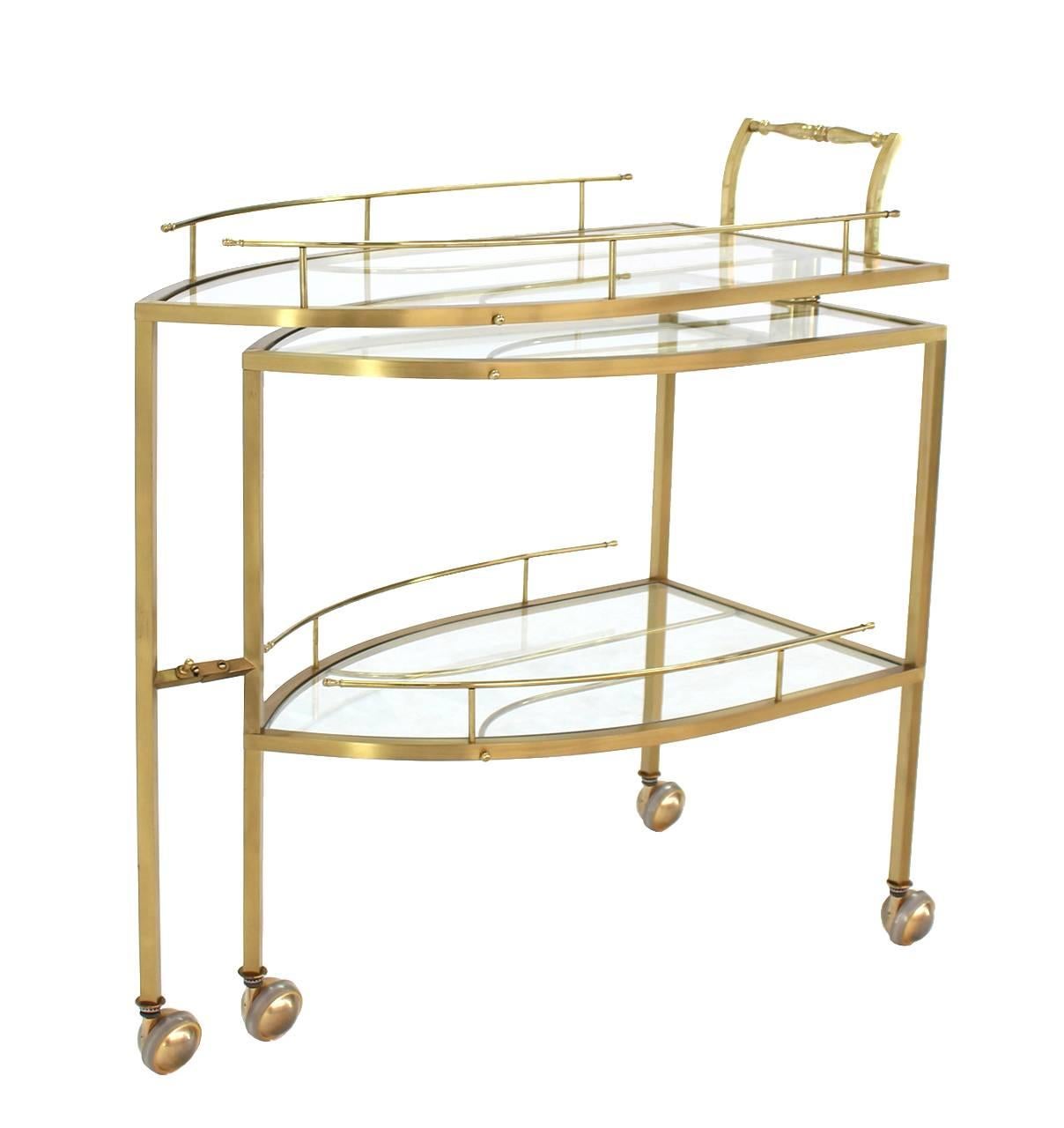 Very nice unusual iron shape brass teacart server or side table.