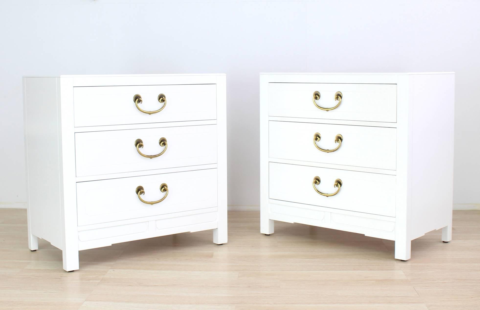 Pair of very nice brass pulls white lacquer three-drawer cabinets.