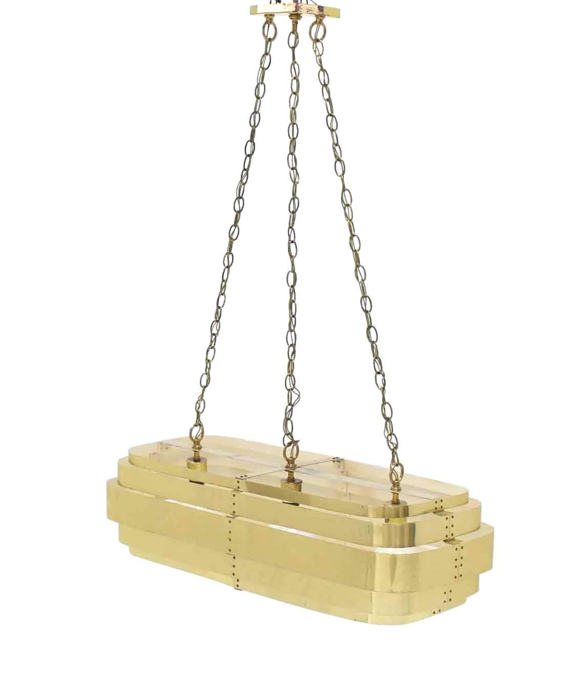 Mid-Century Modern brass light fixture pendant suspended on long chains. May be used as a pool table fixture.