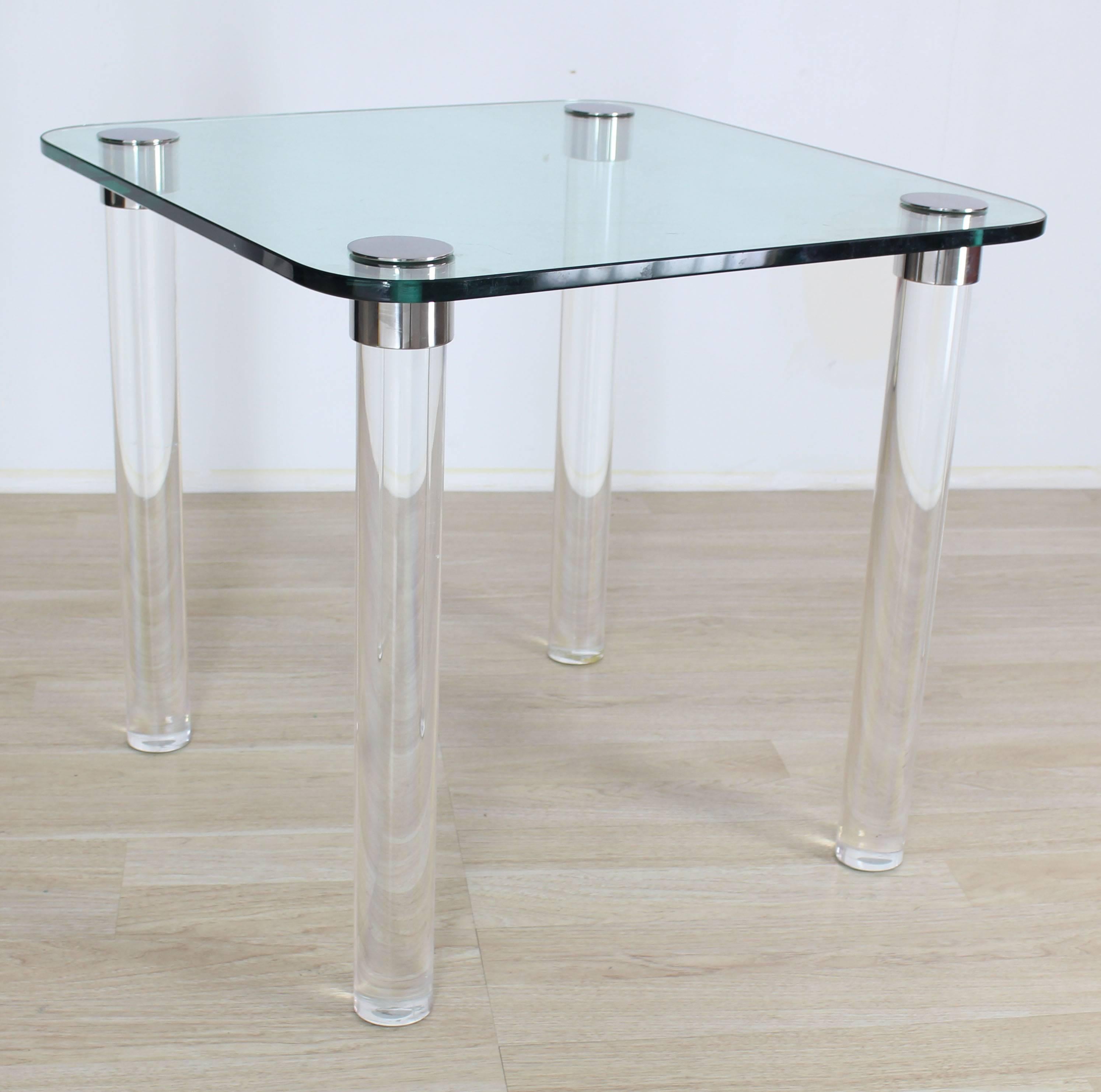 Mid-Century Modern thick Lucite top dinette or game table with rounded corner. Thick heavy Lucite legs. The legs are removable and table can be disassembled for stage or transportation.