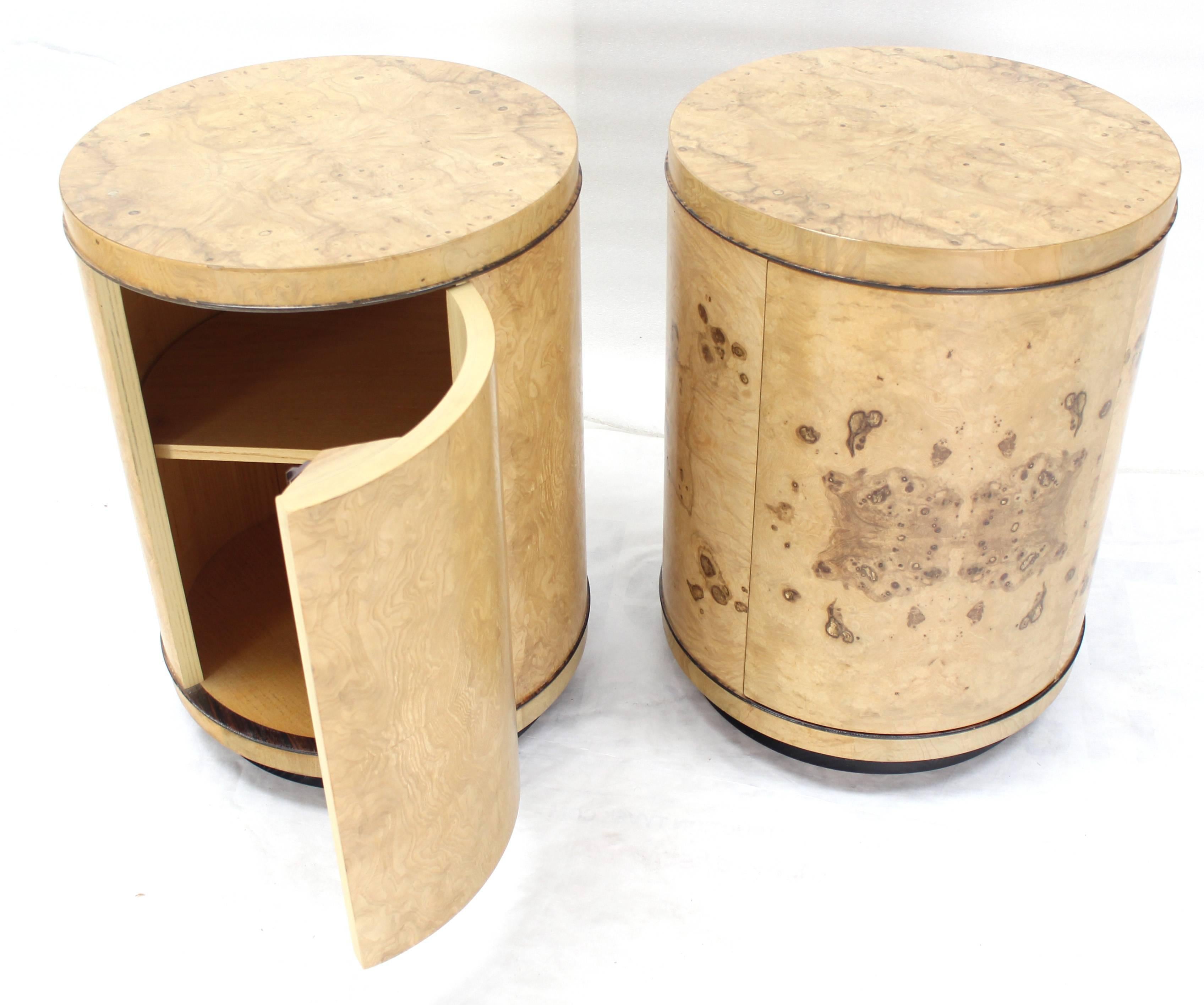 Pair of very nice blonde burl wood cylinder drum shape stands with one door storage compartment.