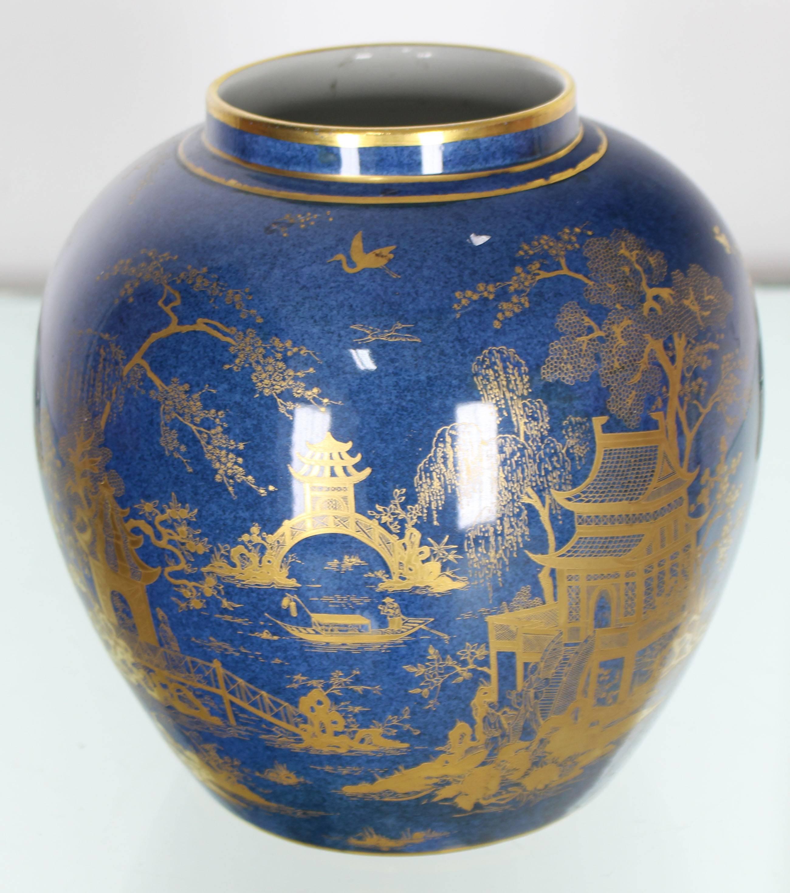 Very nice cobalt blue gold painted decorated globe shape vase. Measures: 8 inches tall.