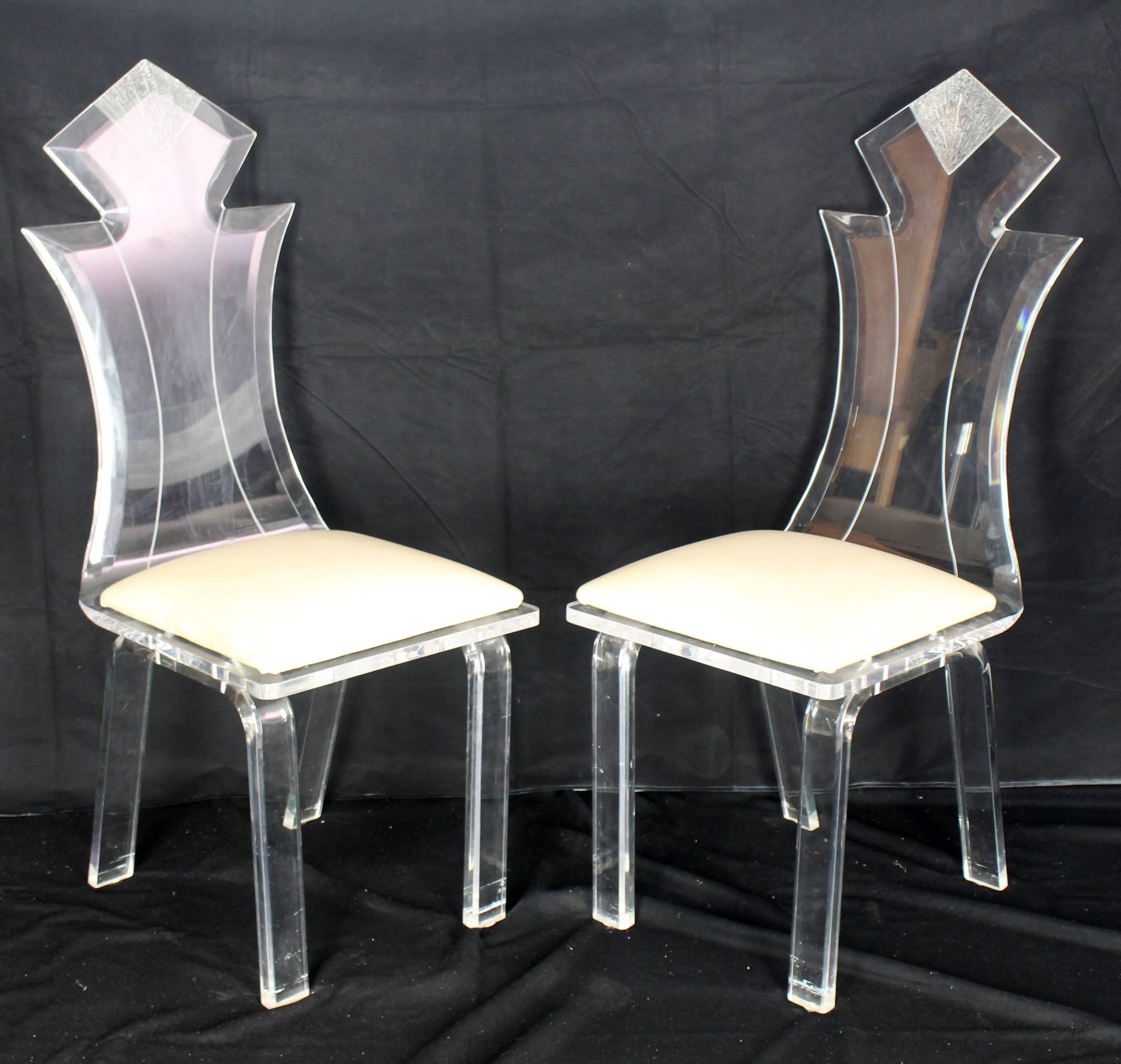 Polished Set of Four Carved Bent Lucite Dining Chairs For Sale