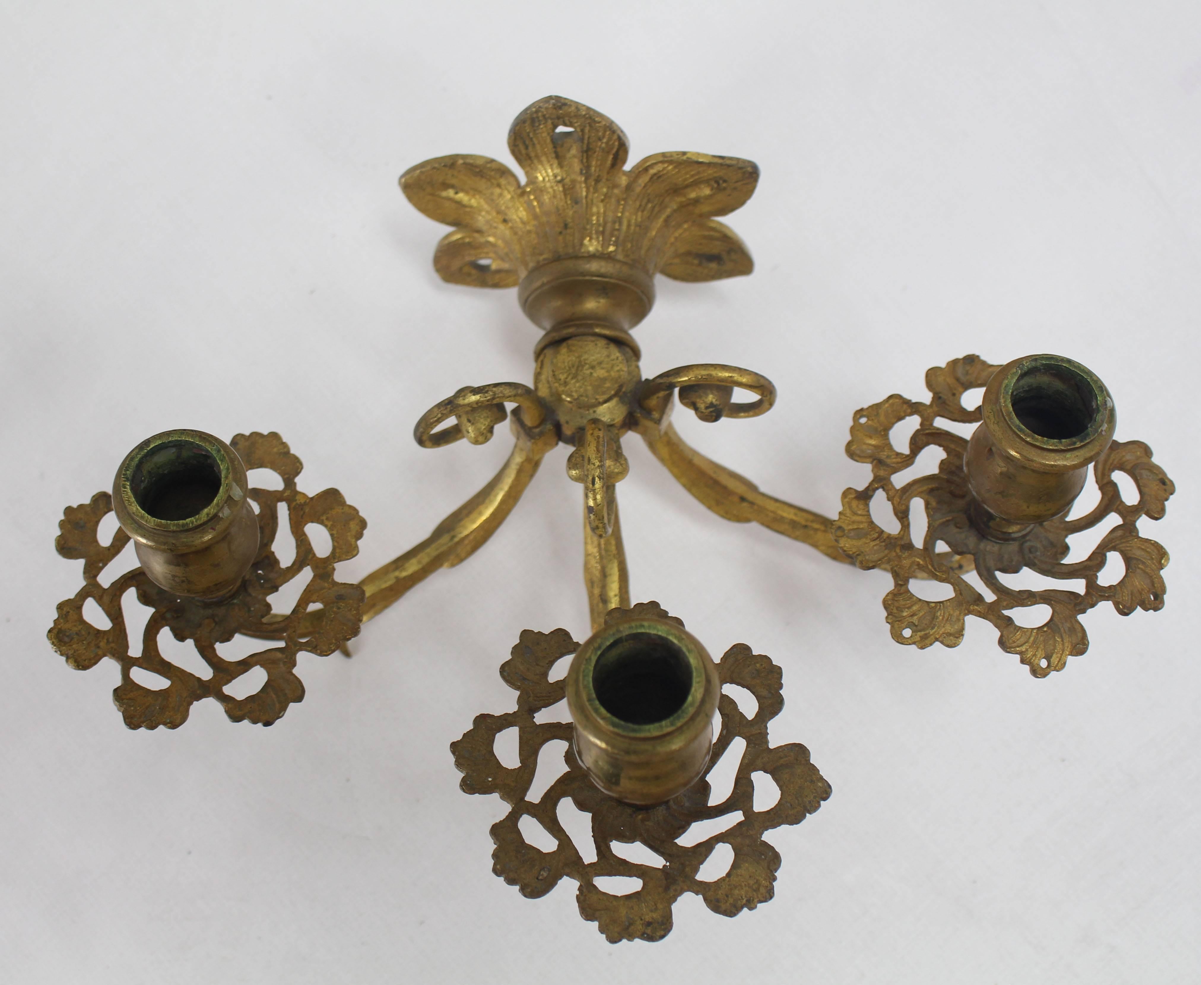 Hollywood Regency Pair of Bronze Candle Sconces For Sale