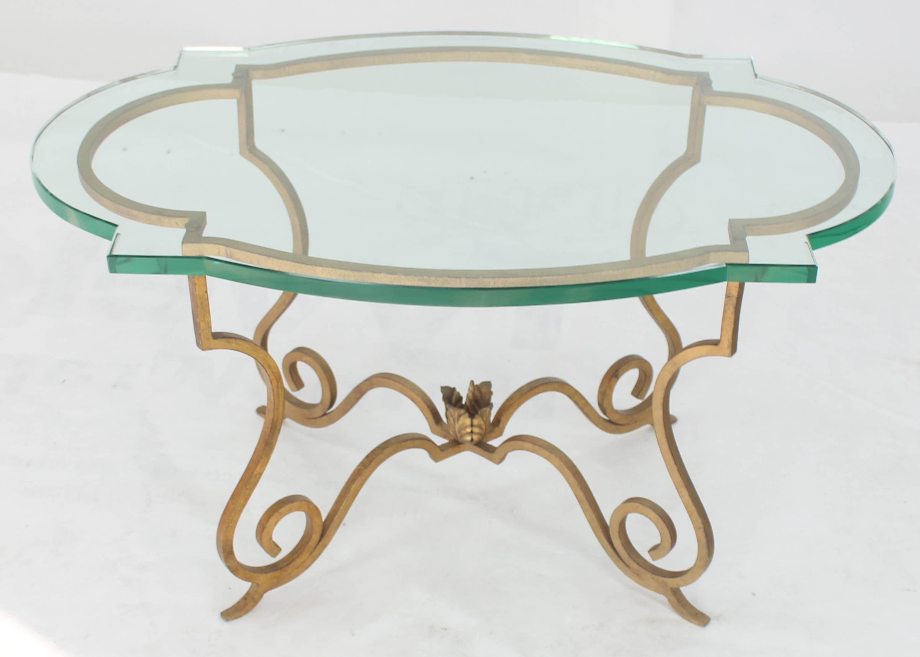 Forged steel base scallop shape glass top side table. Hollywood Regency Mid-Century Modern style. 3/4