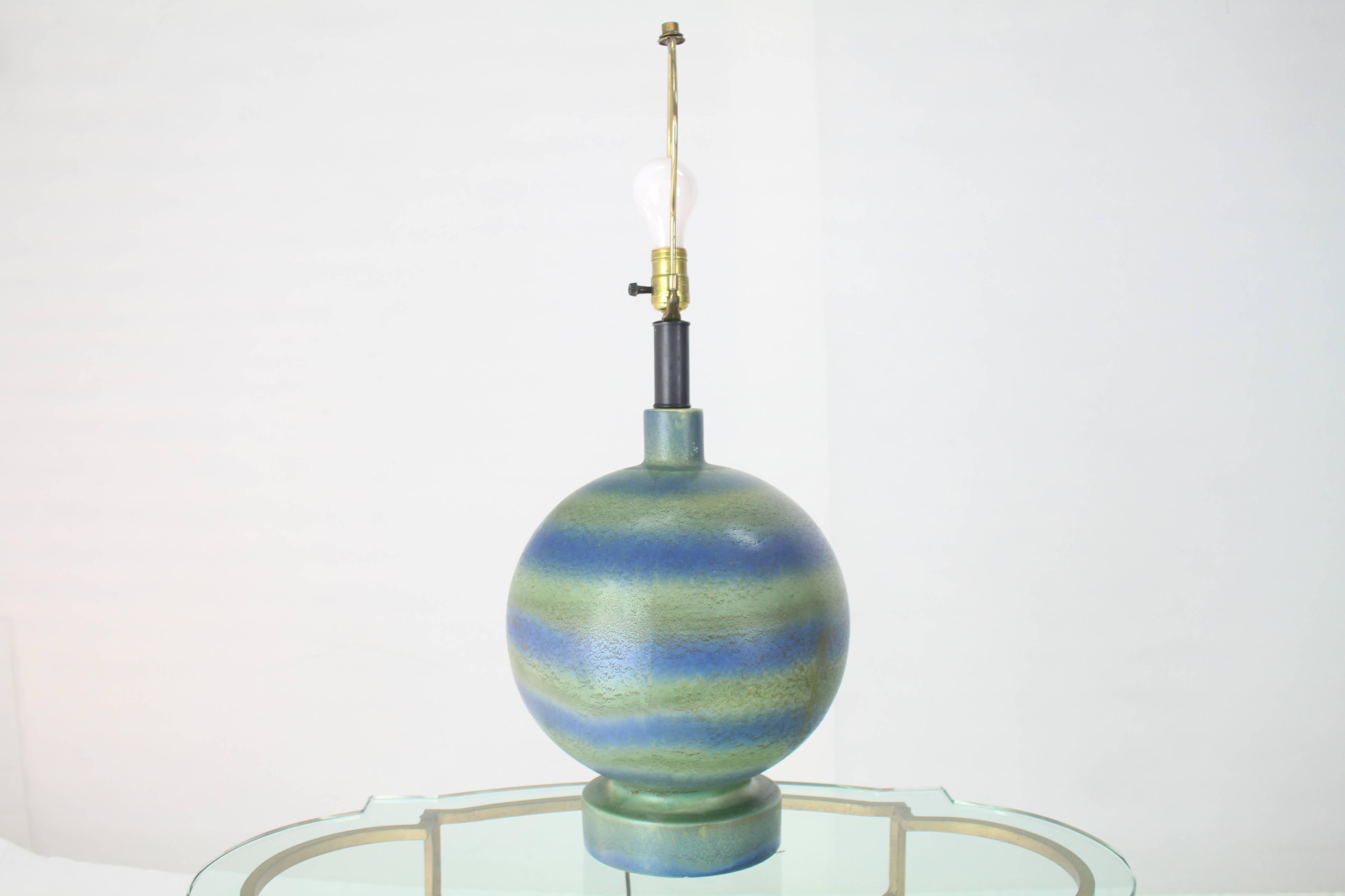 Green and blue striped decorated pottery globe table lamp. Mid-Century Modern design.