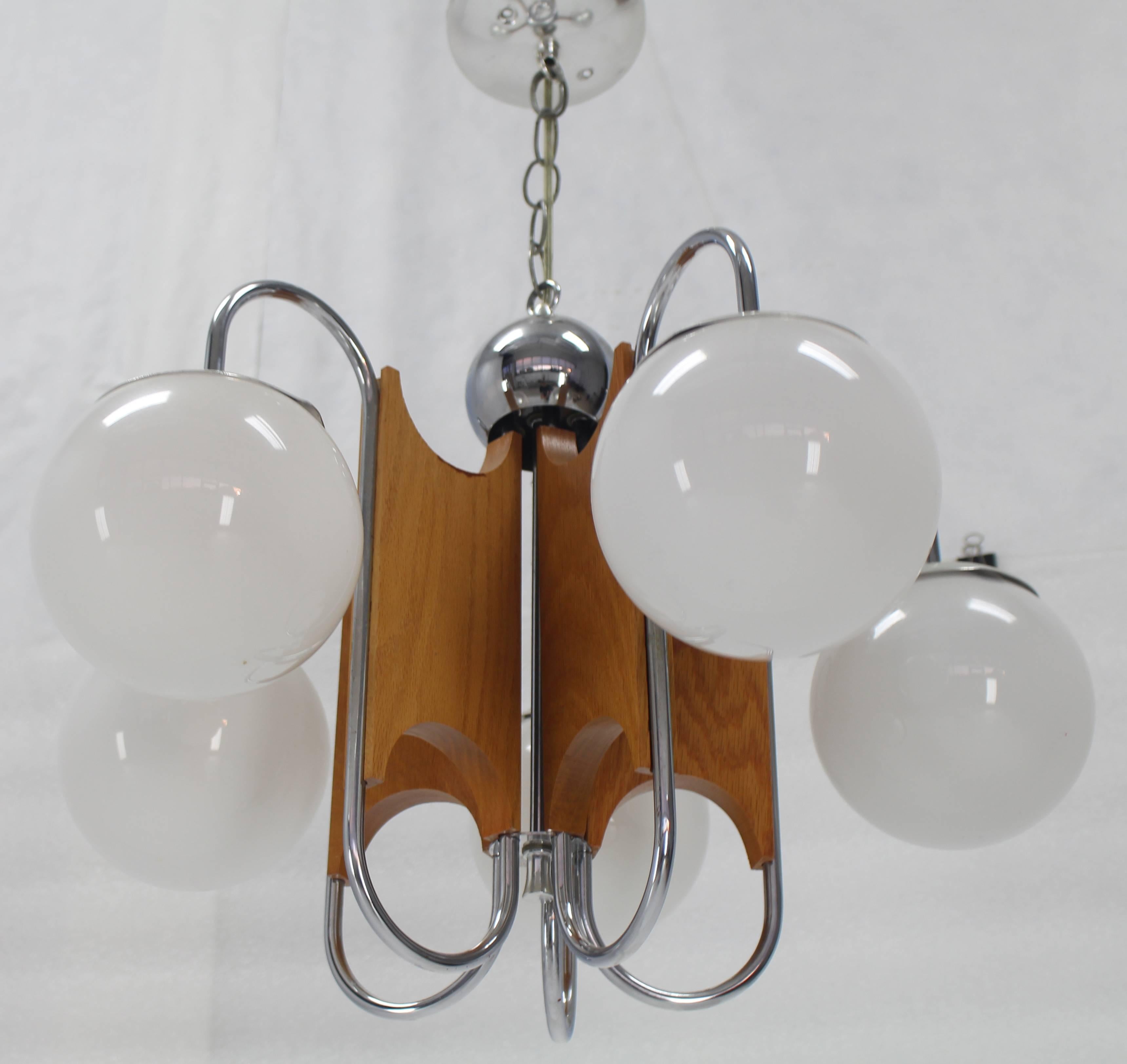 Chrome milk glass globes Mid-Century Modern light fixture.