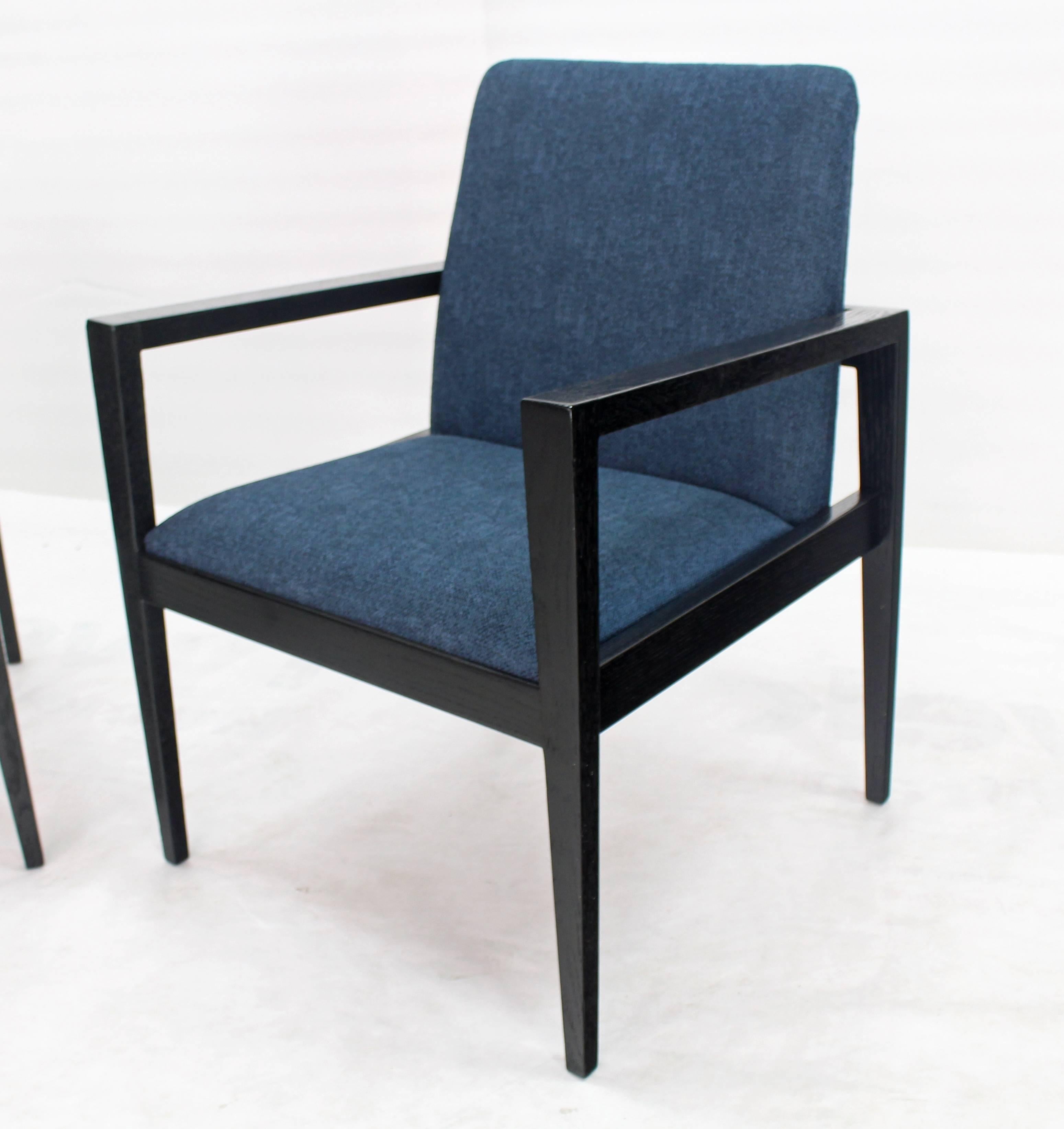 Pair of black lacquer framed new blue upholstery fabric lounge chairs. Nice tapered legs.