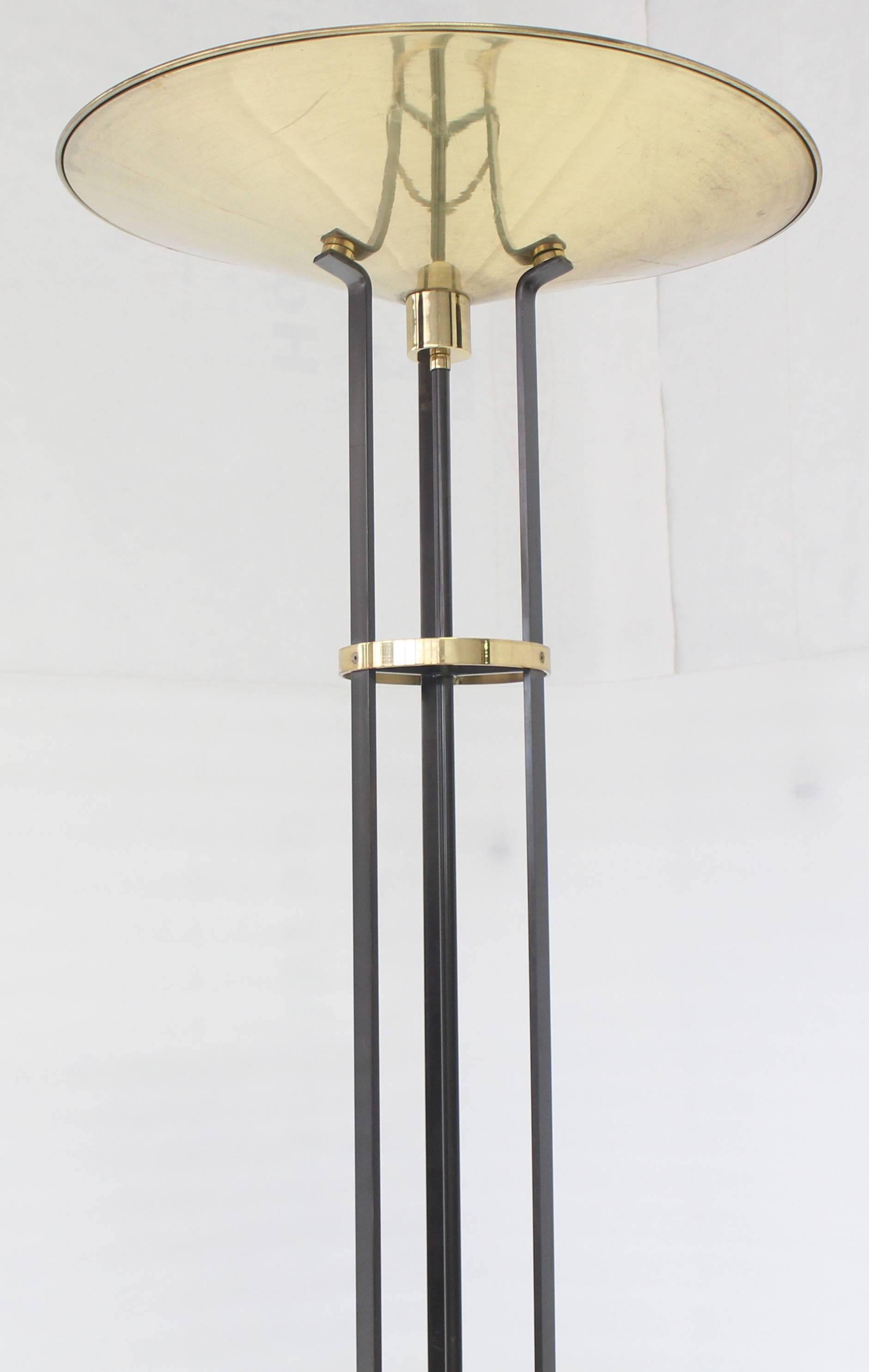Mid-Century Modern Italian brass torchere floor lamp on tripod base with dimmer.