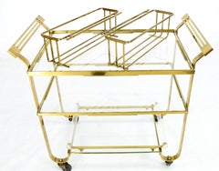 Le chariot de bar en laiton massif et verre de style mi-siècle moderne