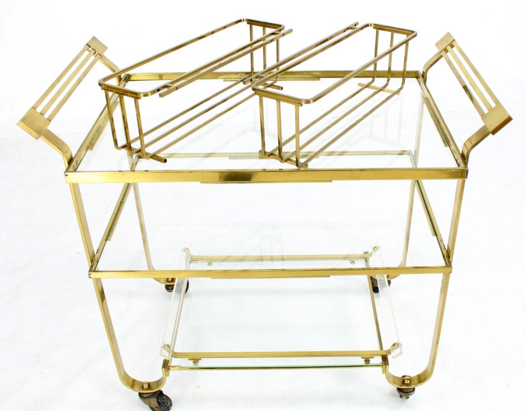 Mid-Century Modern Art Deco solid brass and glass bar cart. Outstanding clockwork quality craftsmanship.