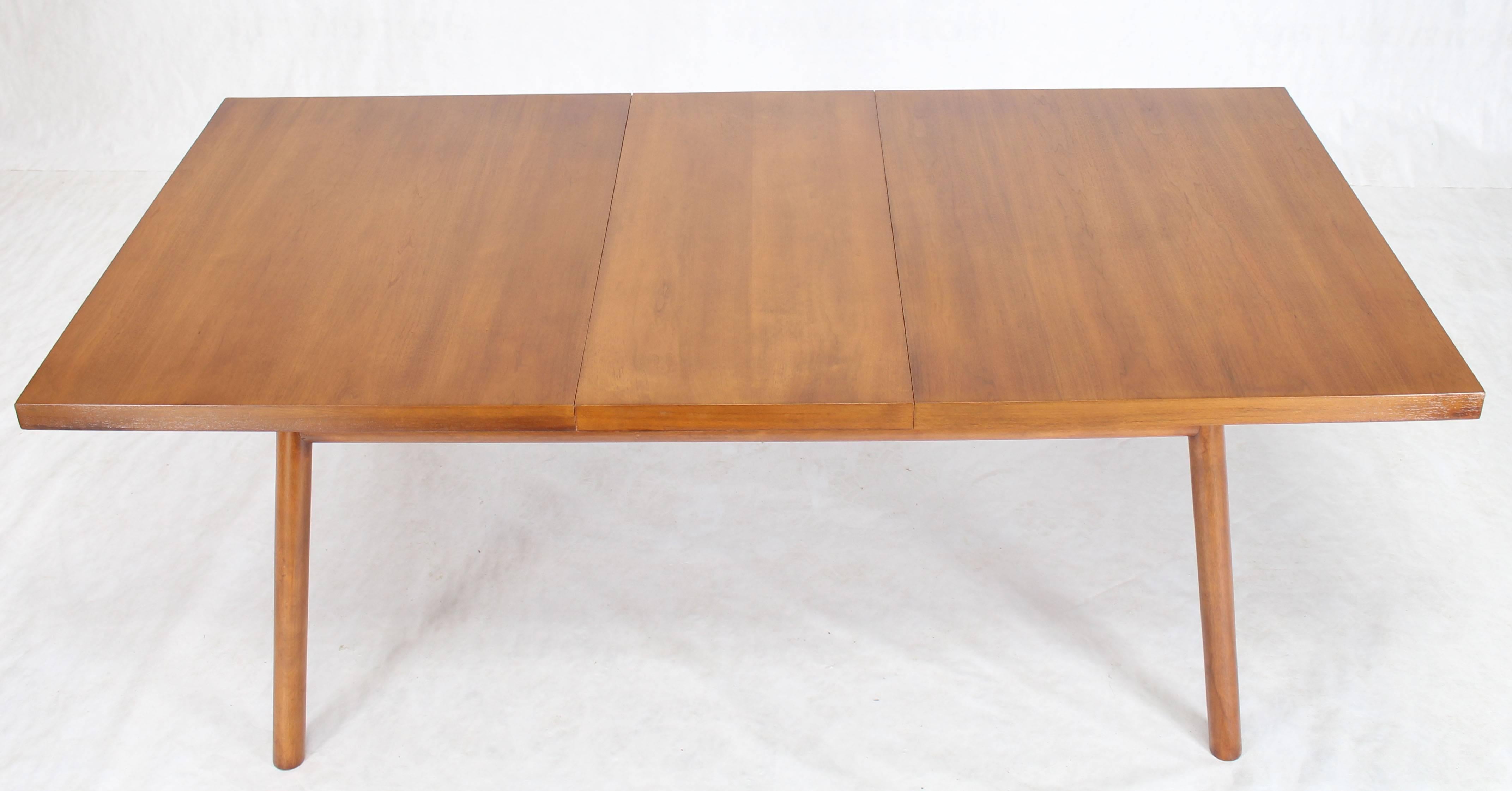 Mid-Century Modern walnut dining table designed by Robsjohn-Gibbings for Widdicomb. Measures: 1 x 18
