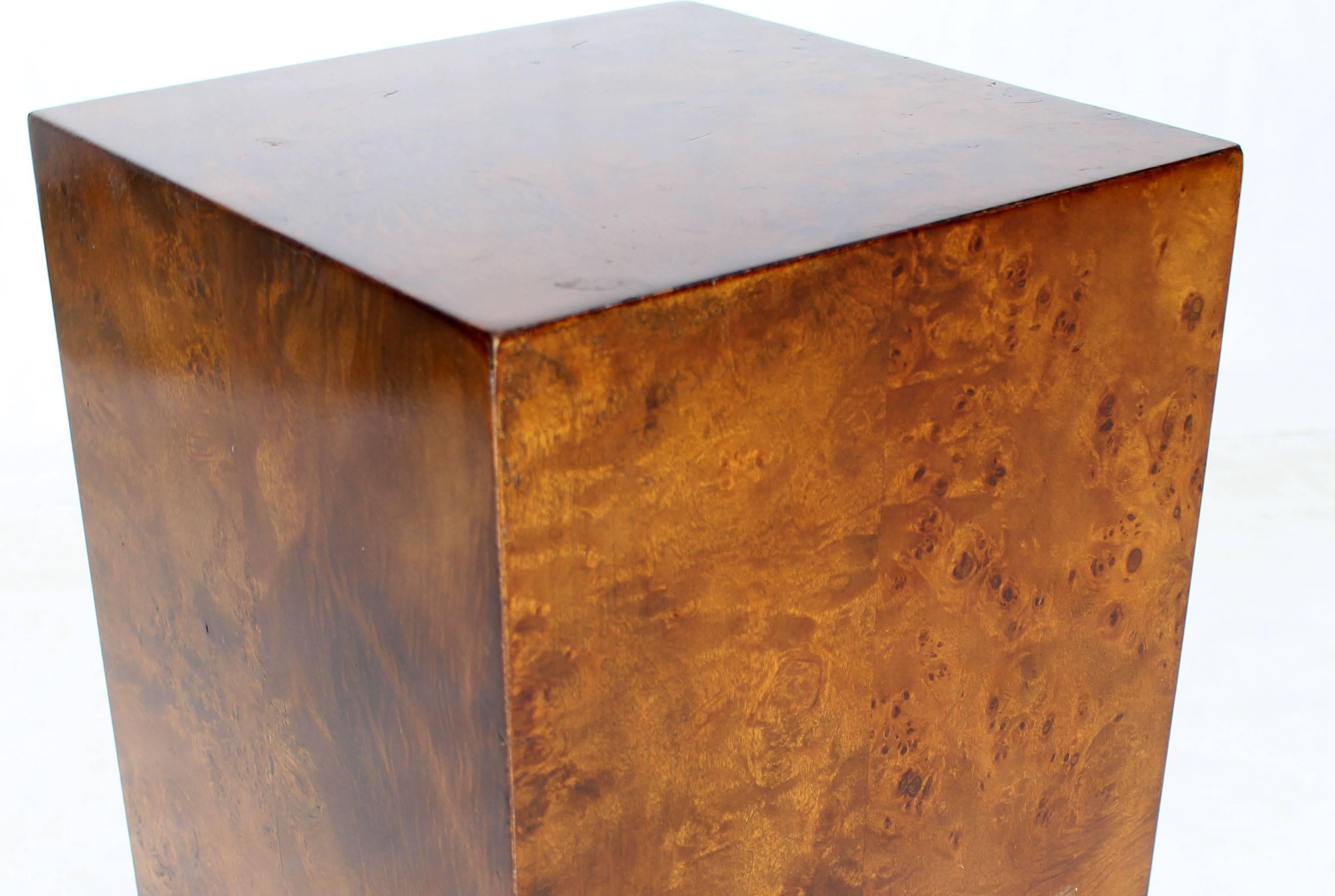 Mid-Century Modern burrowed square pedestal.