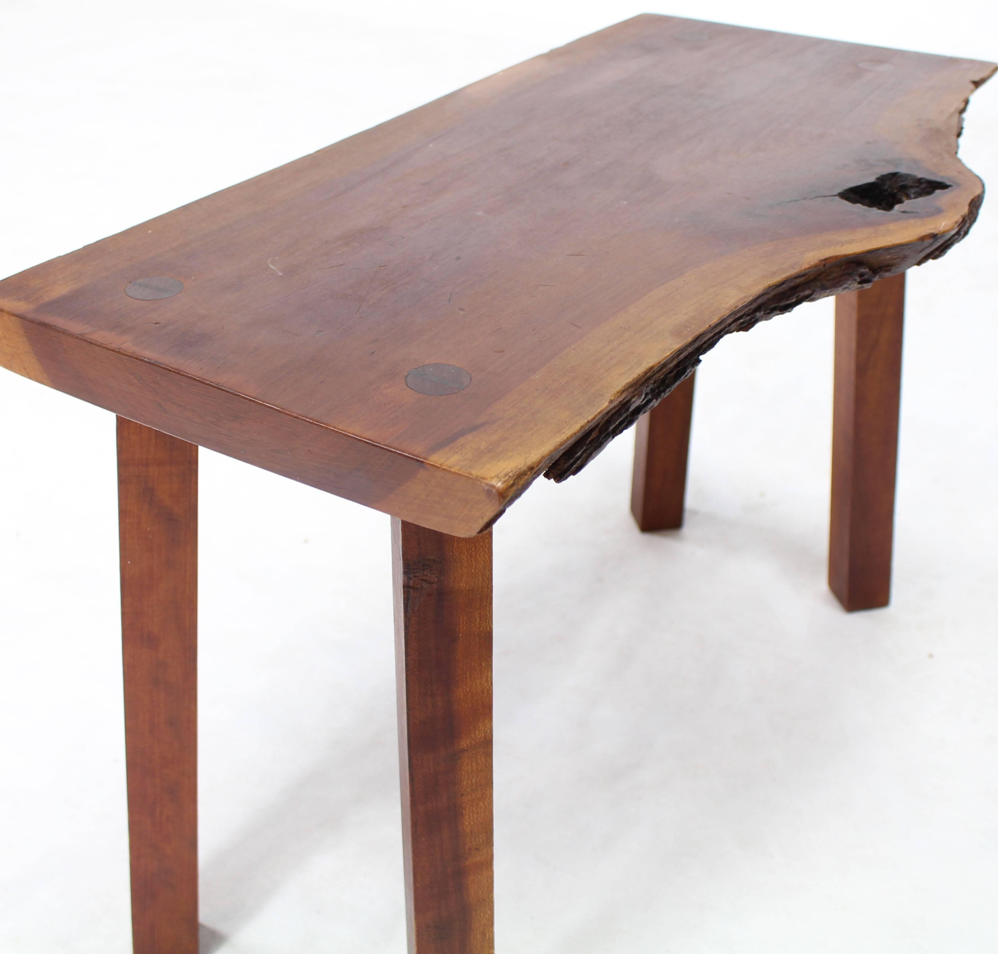 Mid-Century Modern organic walnut medium size bench or side table.