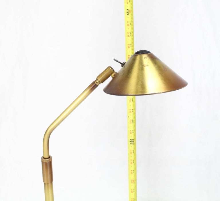 Covacs adjustable Mid-Century Modern brass floor reading lamp. Measure: Adjustable height 45-62