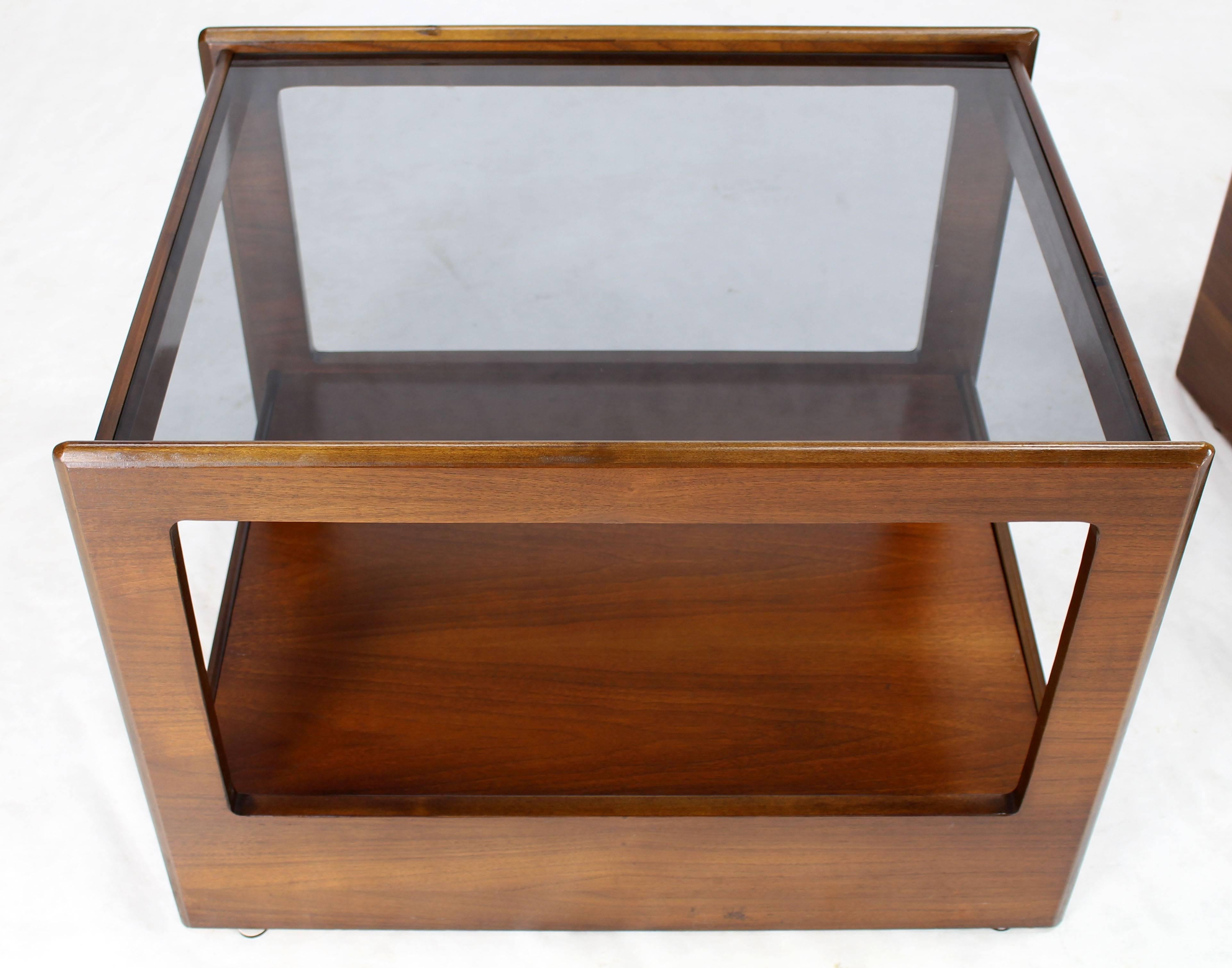 Pair of walnut Mid-Century Modern glass top cube shape two-tier end side tables stands with one drawer. Nice oiled walnut finish.