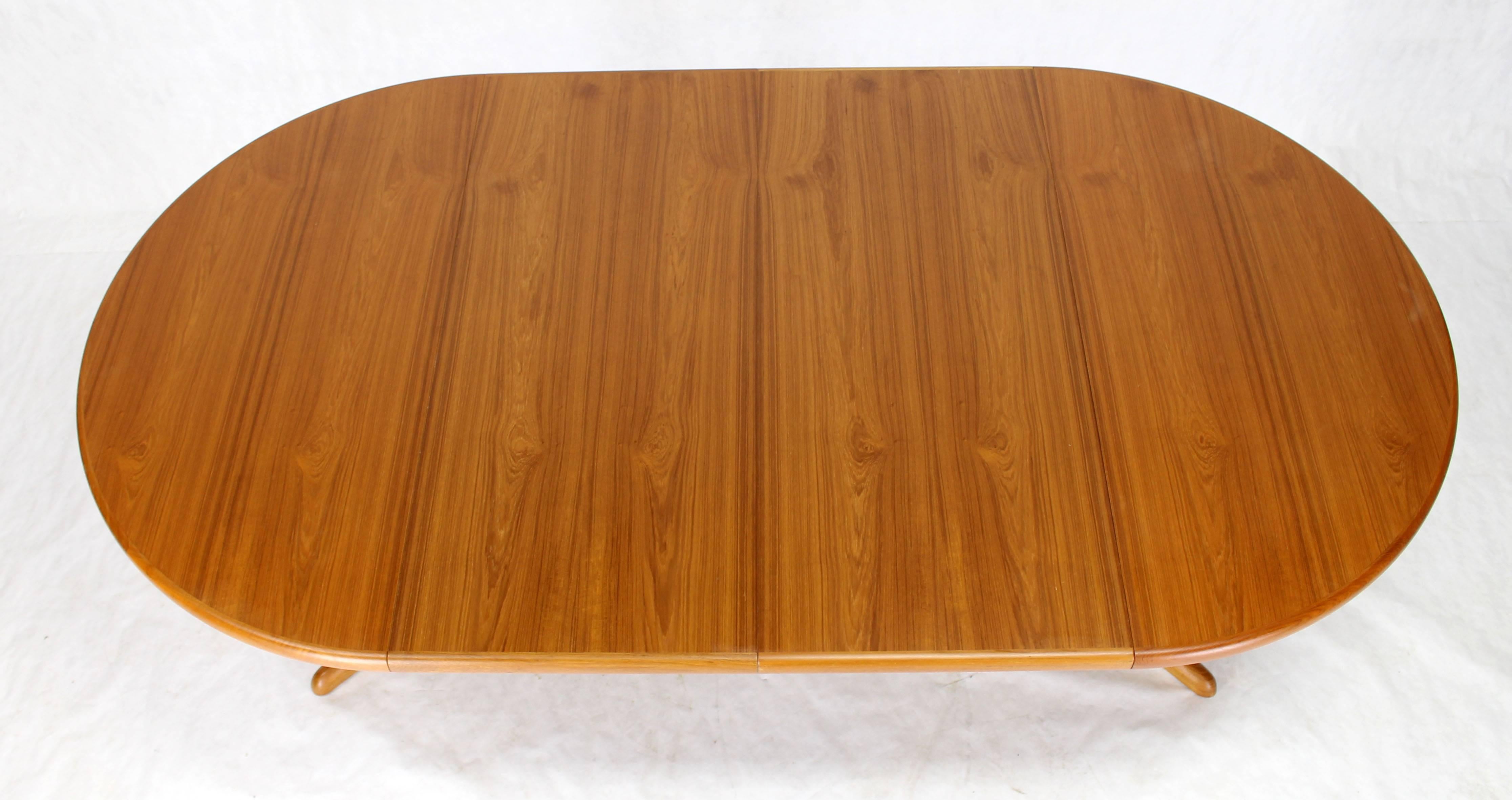 Danish Round Mid-Century Modern Teak Dining Table with Two Leaves 1