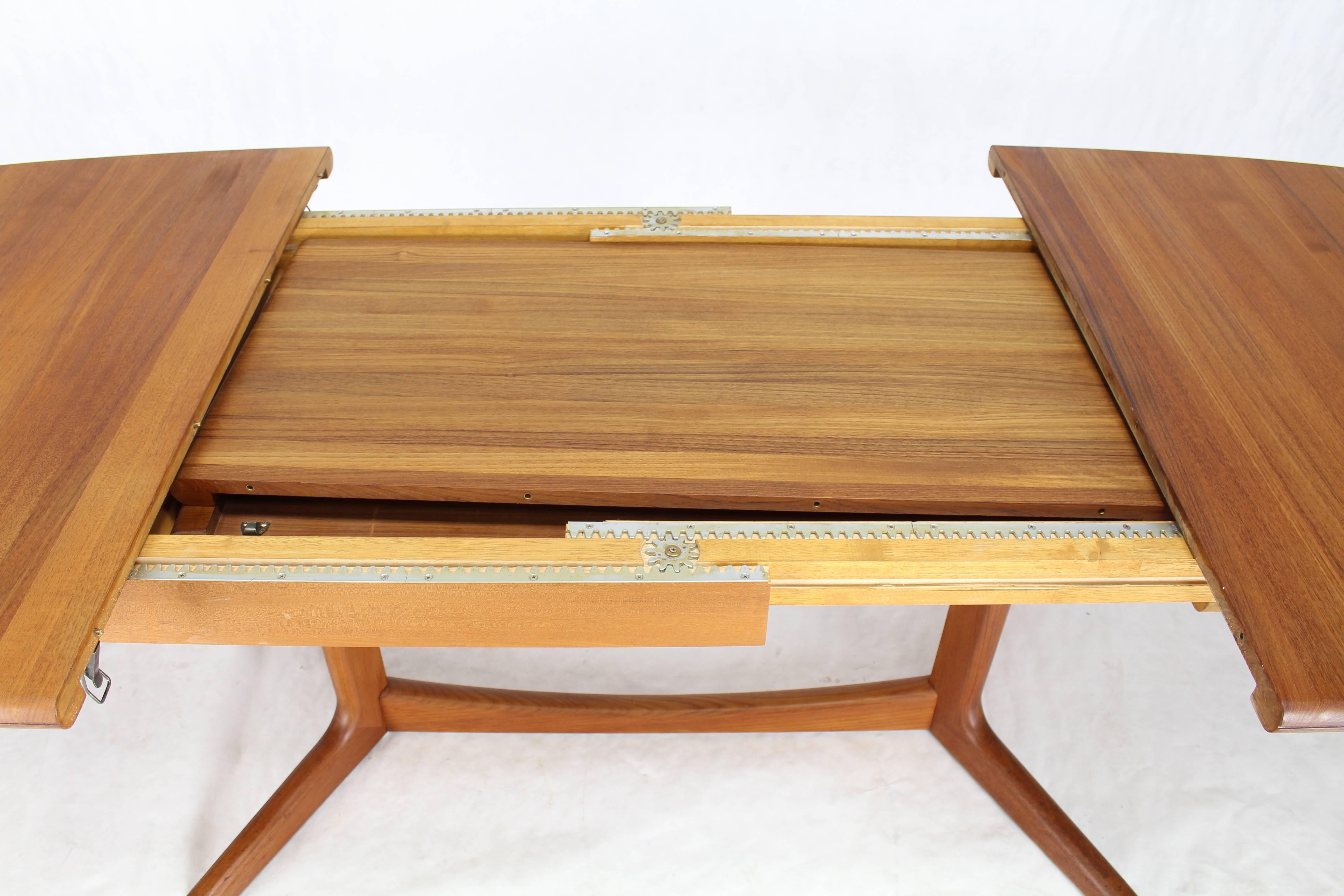 Hard to find all solid teak Danish modern dining table with two self-containing 20