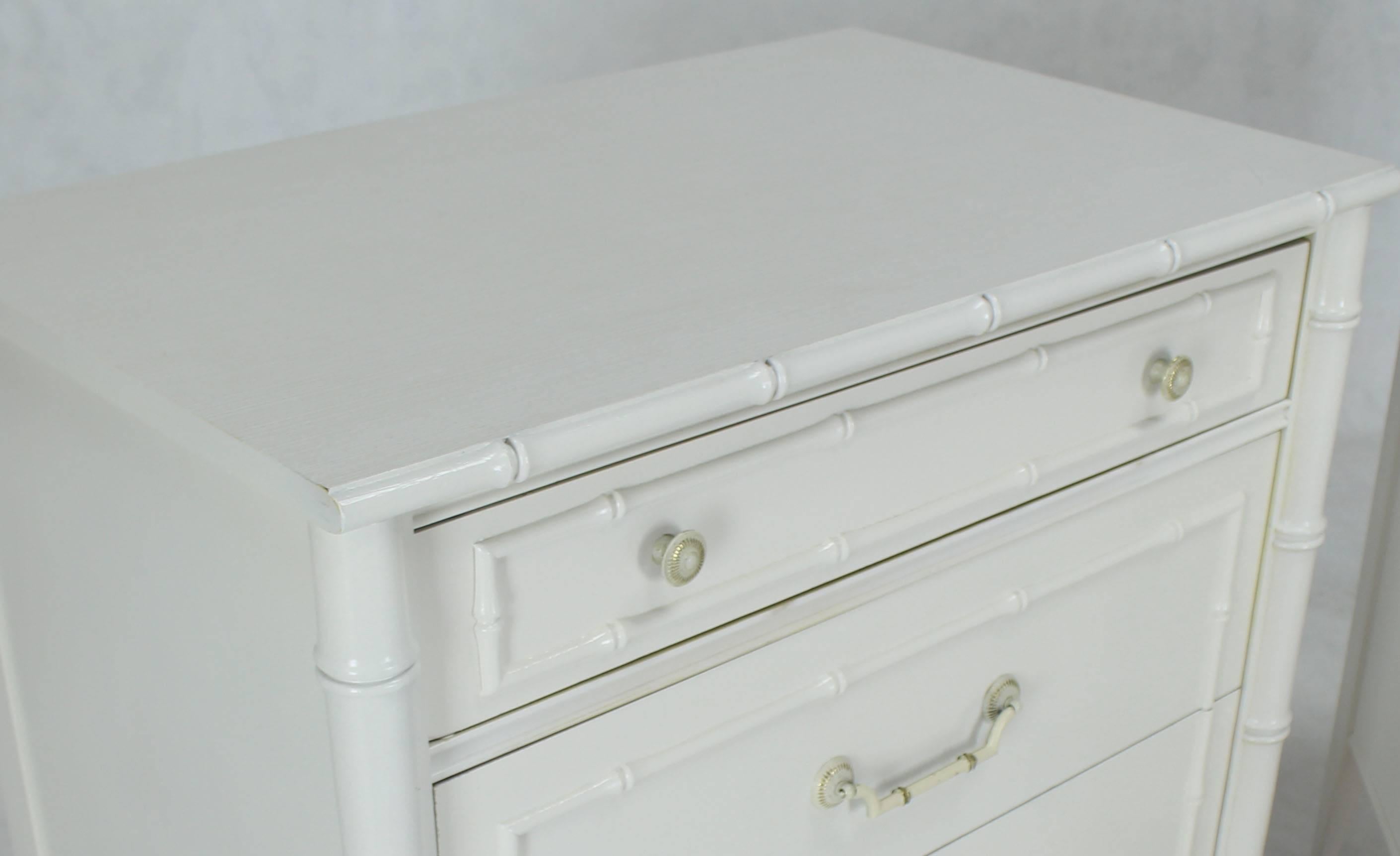 Mid-Century Modern white lacquer faux bamboo large nightstands or bachelor chest. Solid brass hardware.