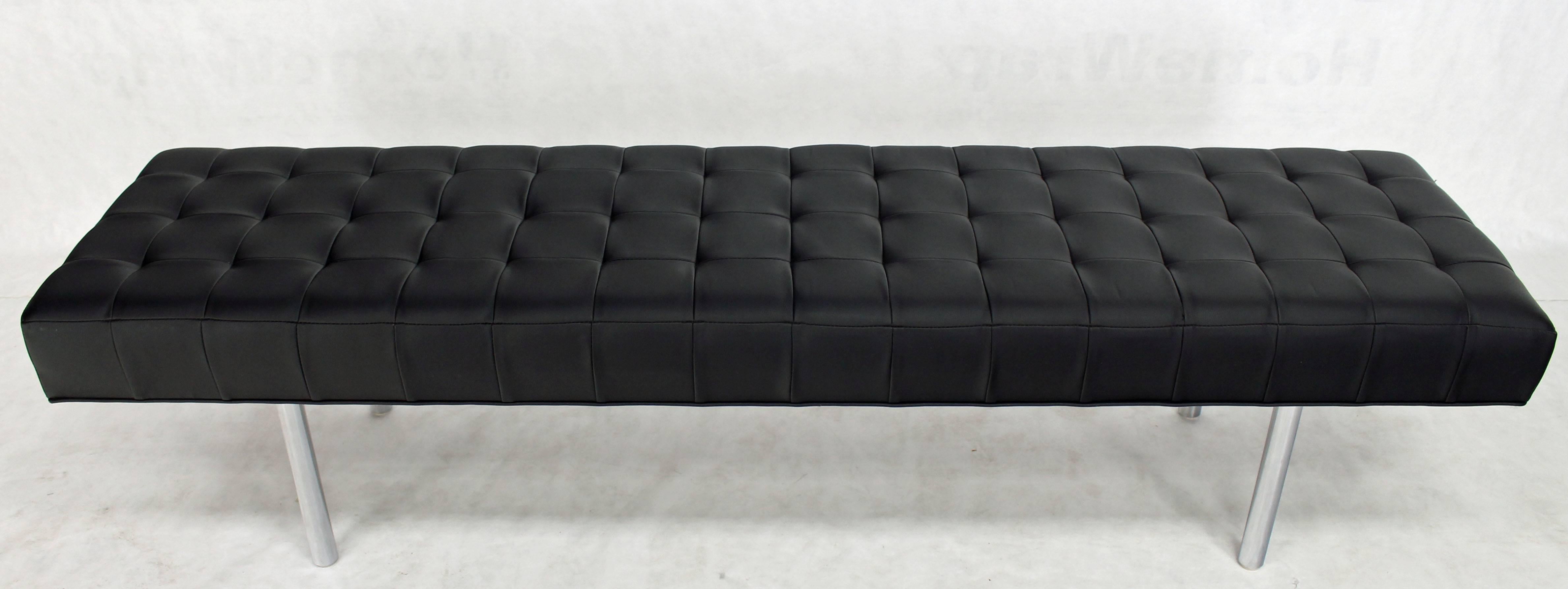Mid-Century Modern long black tufted upholstery bench, or almost narrow daybed.
