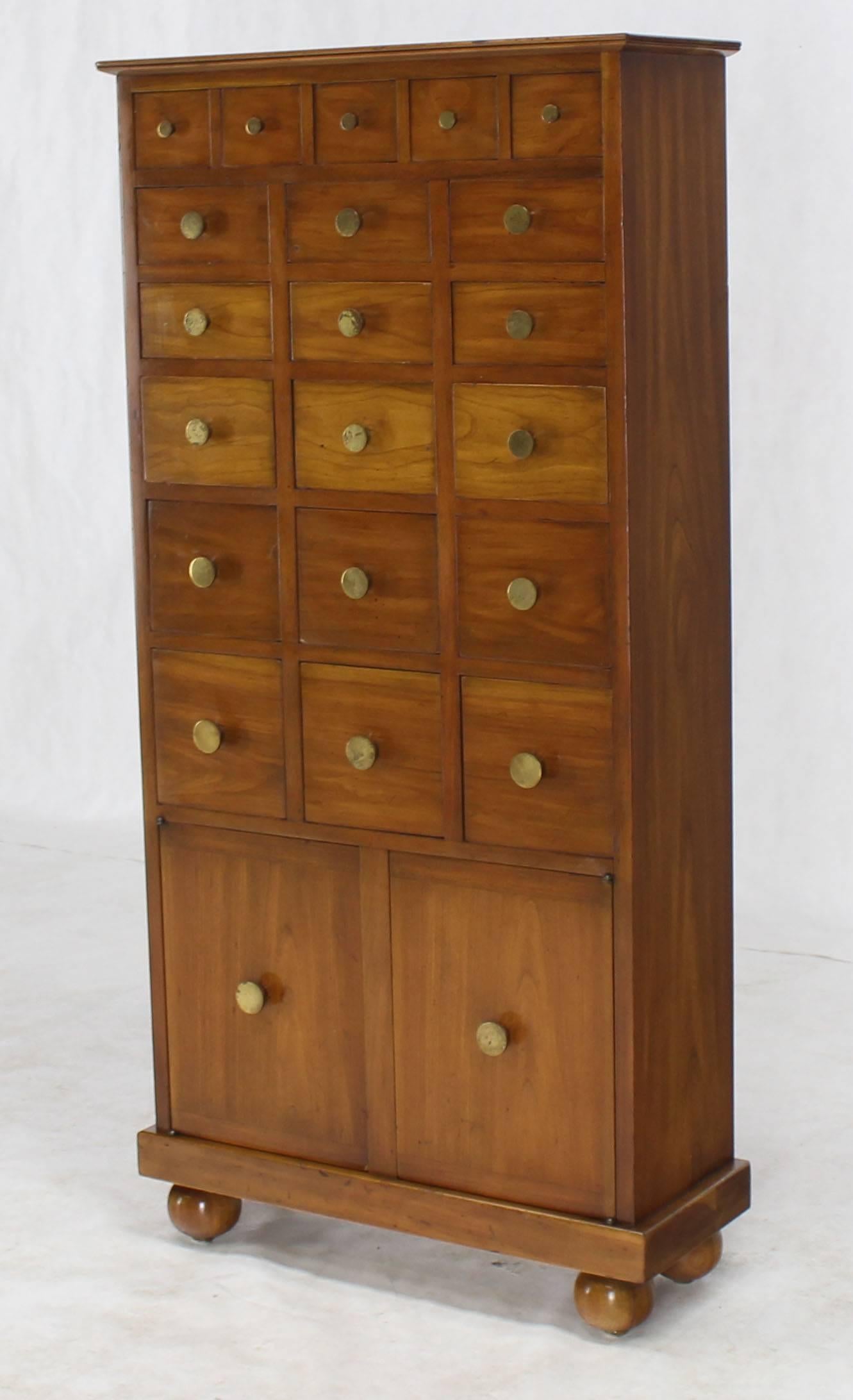 Unusual functional organizer chest of 20 different sizes drawers chest big boy. Only 8 inches deep. Two door compartment on the very bottom.
 