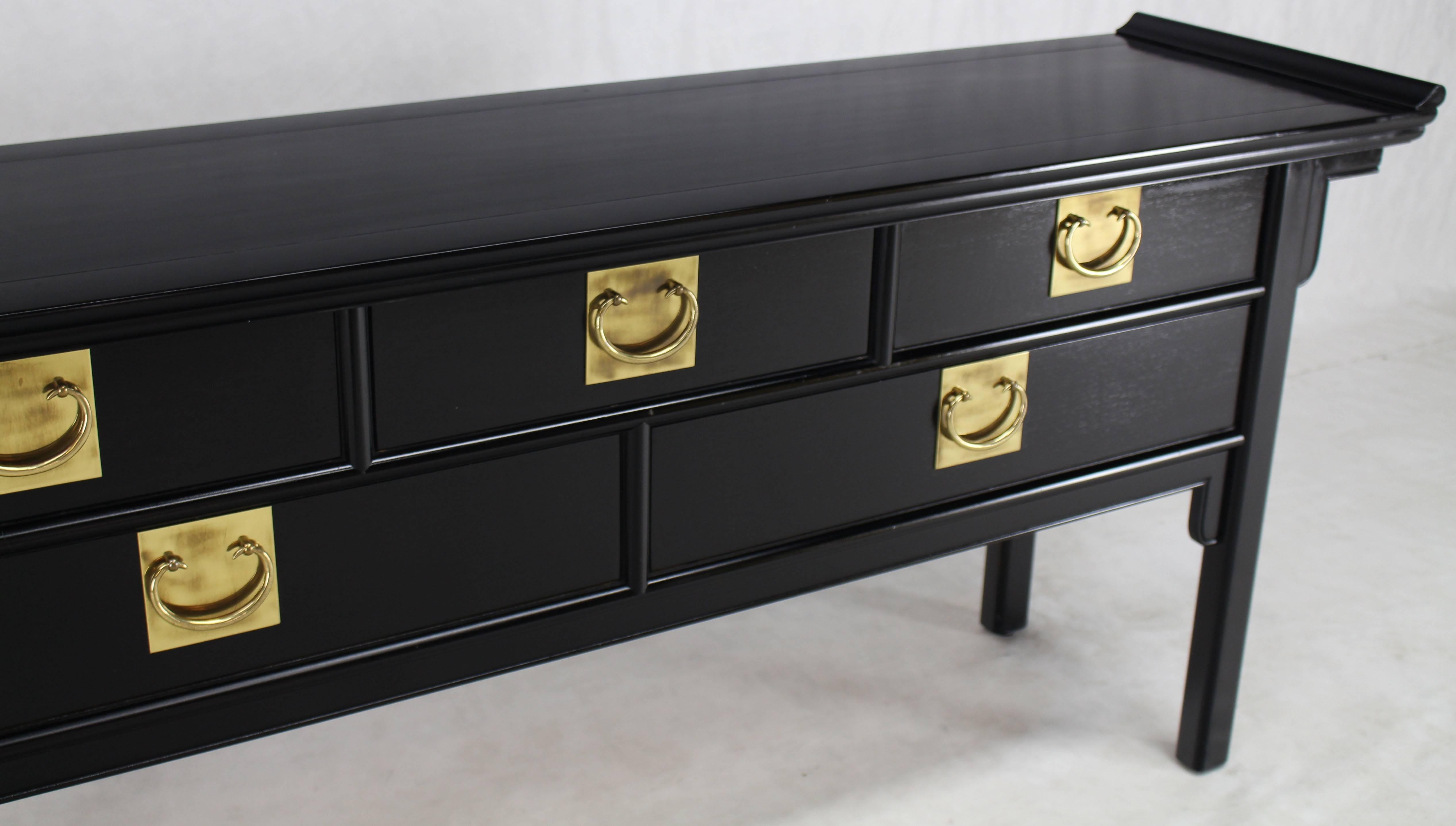 Very nice solid brass horse shoe style pulls black lacquer five-drawer cabinet server sideboard.