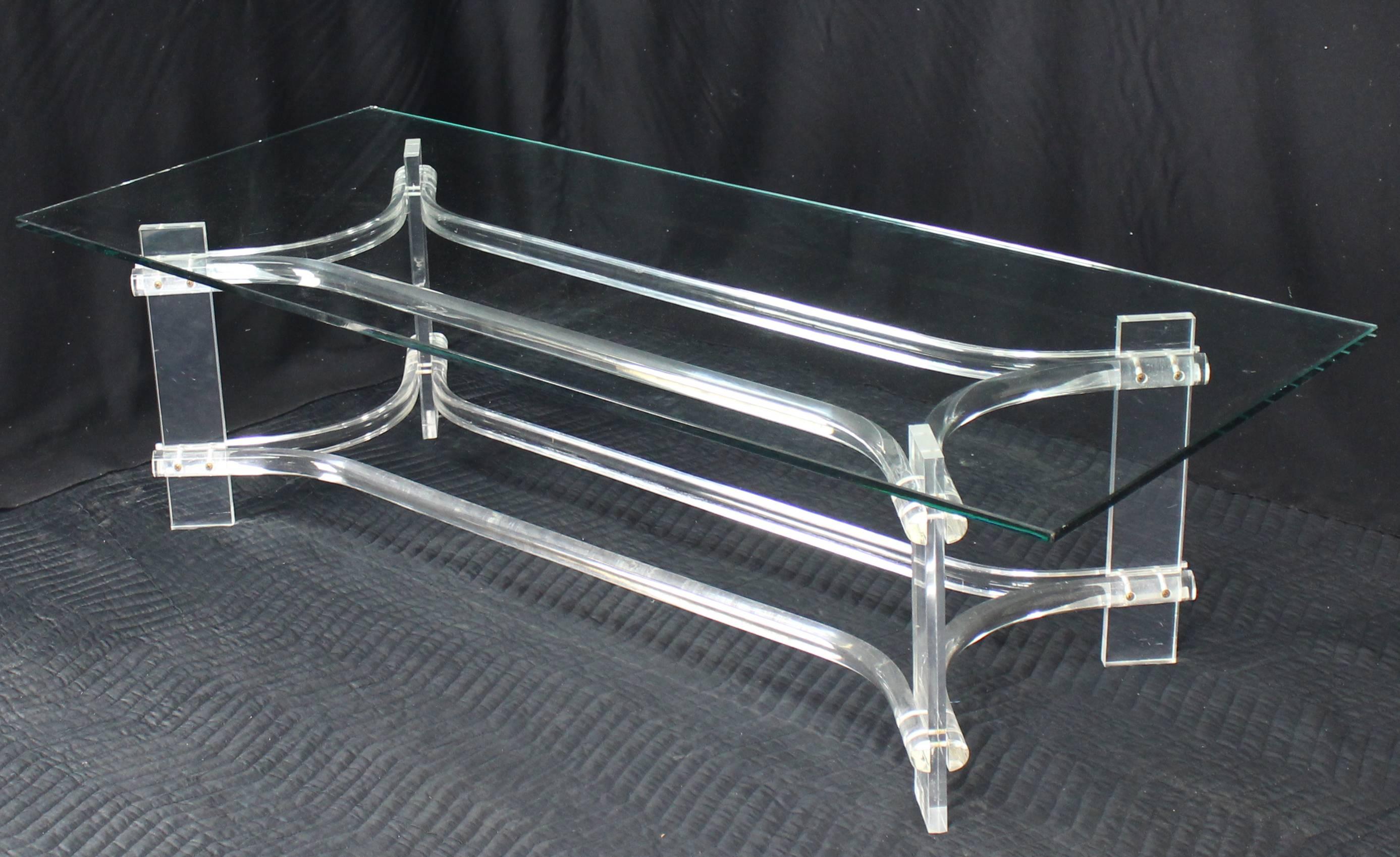 Sharp Mid-Century Modern bent Lucite glass top coffee table.