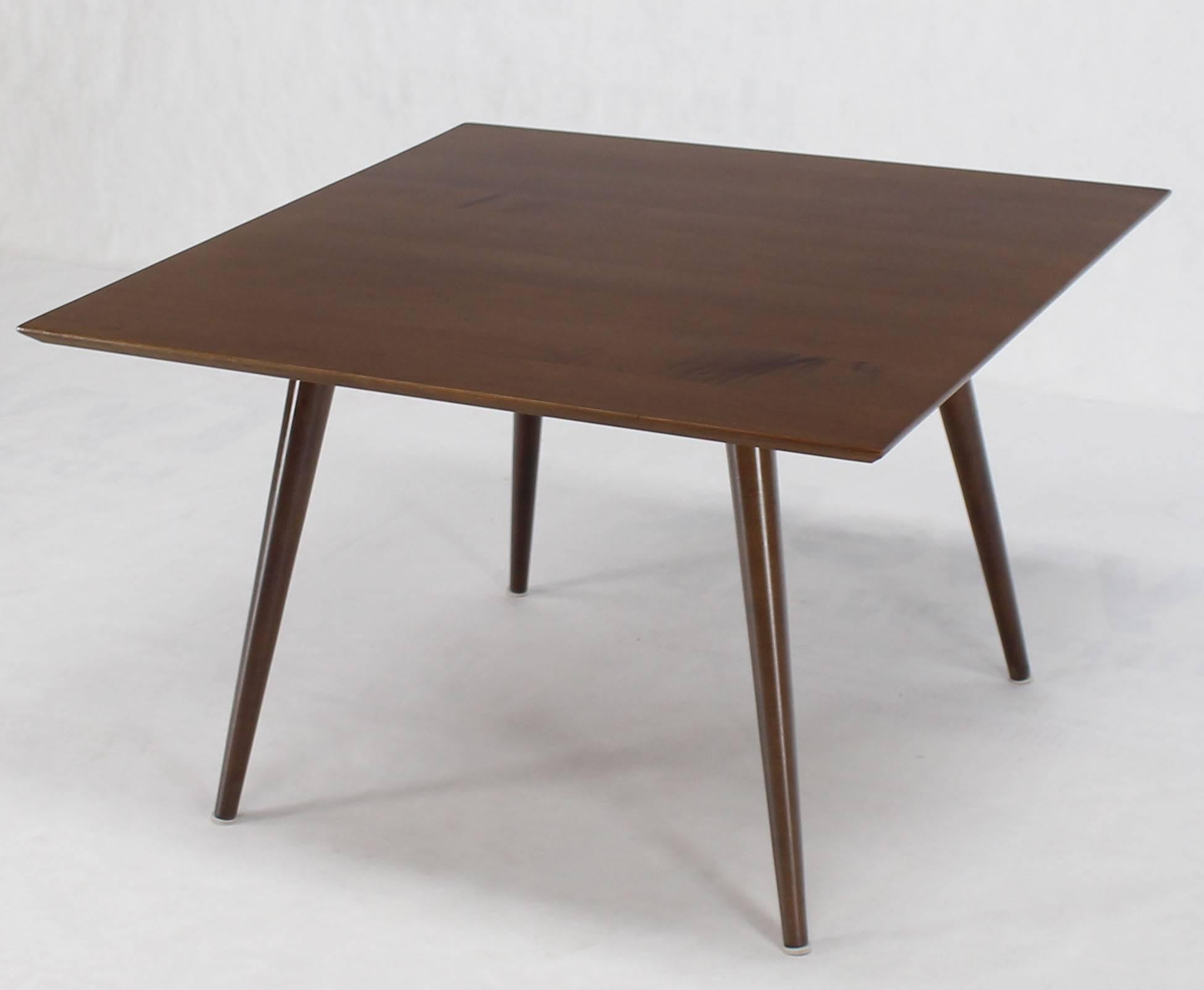 Very nice Mid-Century Modern square center table with con tapered legs.