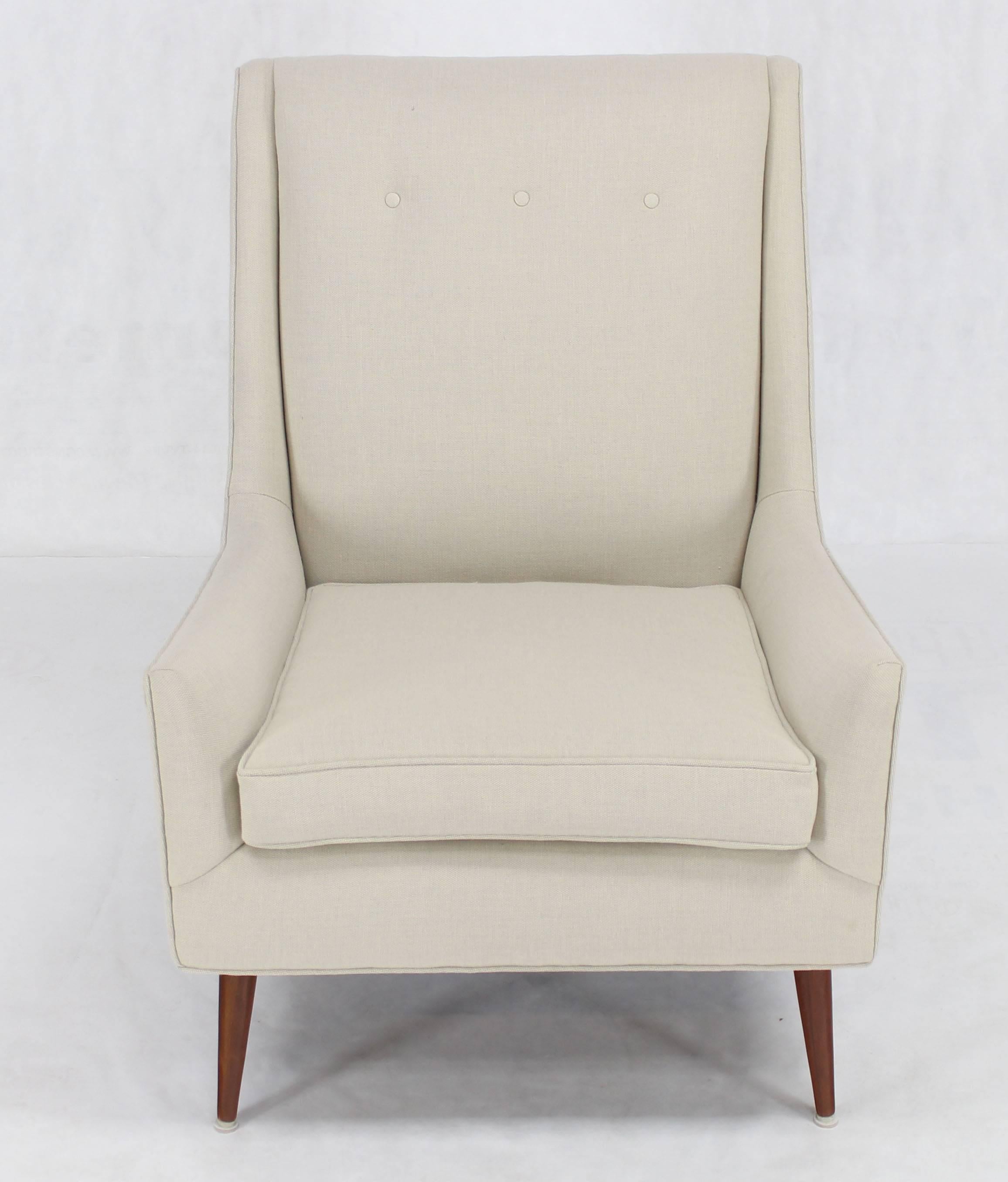 Mid-Century Modern dowel cone legs McCobb lounge chair newly upholstered in linen like fabric.
