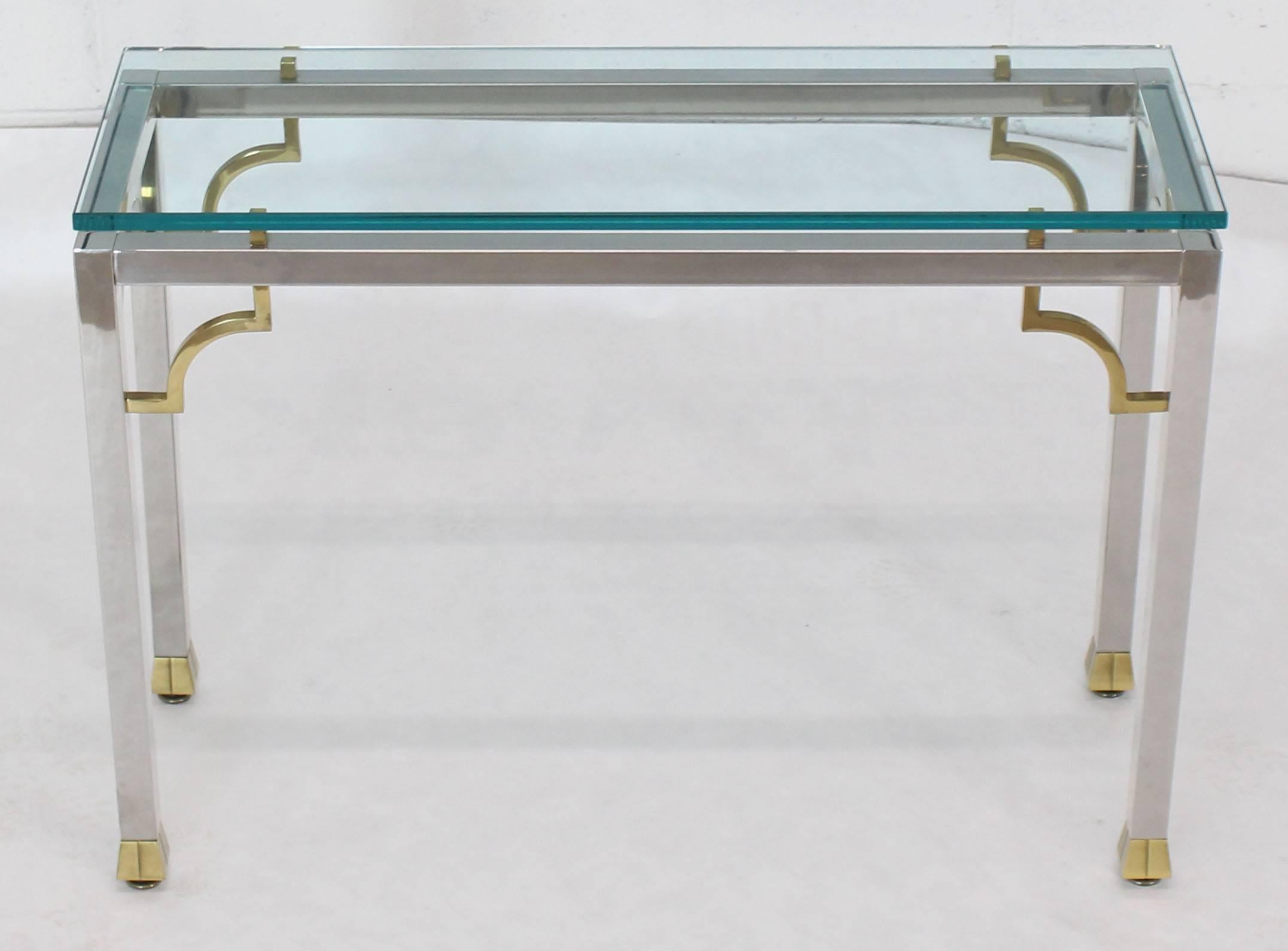 Mixed metals Mid-Century Modern console table. Nice tapered brass feet.