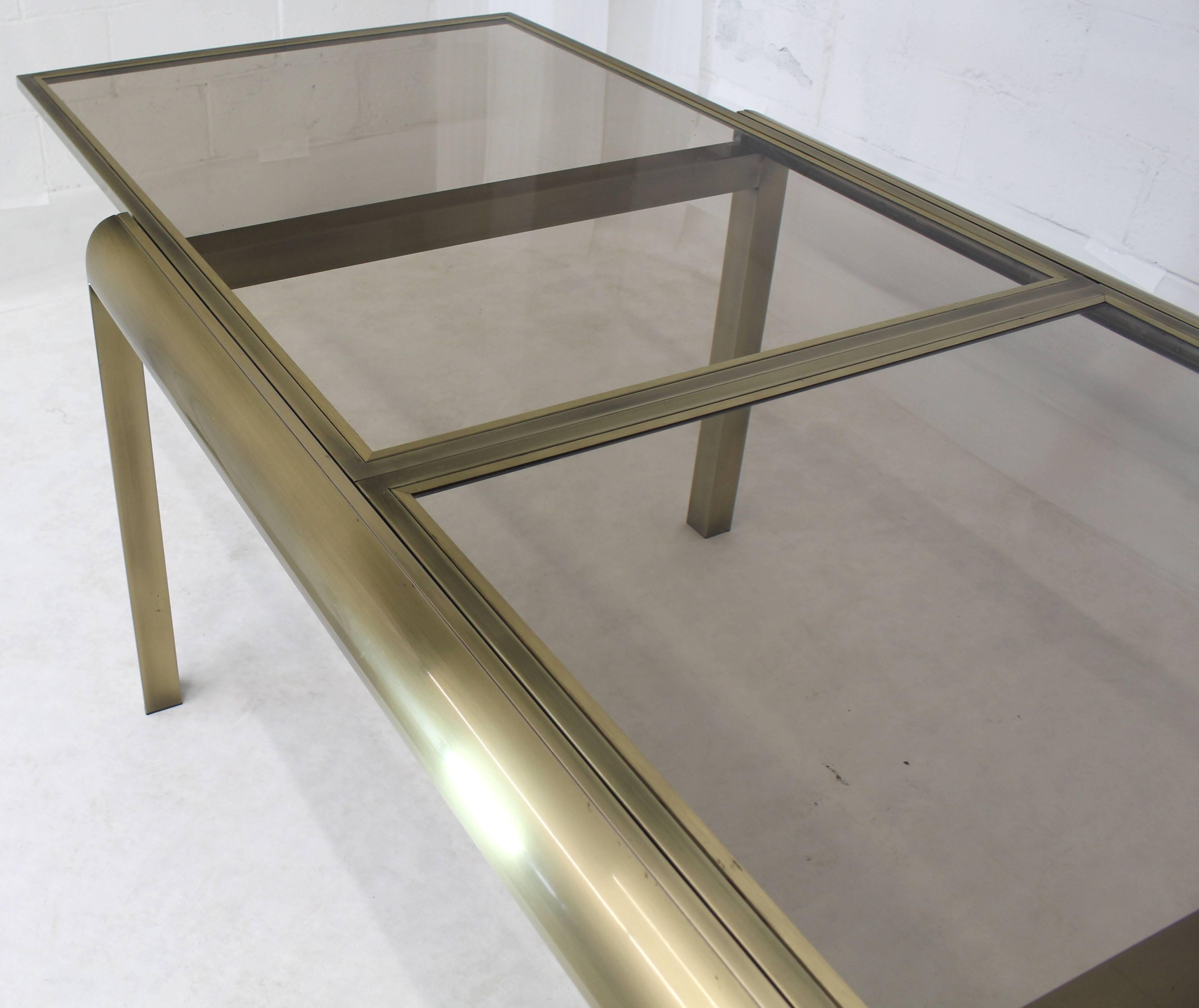 glass and brass dining table