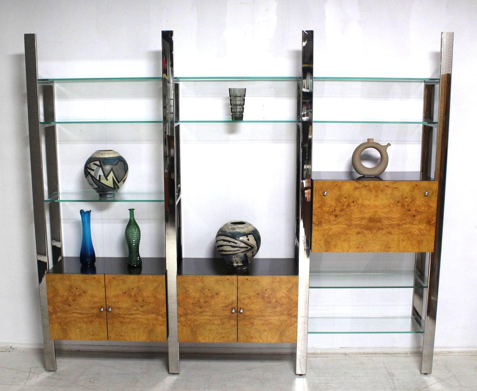 Mirror chrome polished stainless steel frame, burl wood cabinets, thick glass shelves Mid-Century Modern wall unit. Secretary drop desk compartment. Outstanding modern decor setting piece of furniture. Multiple possibilities. 