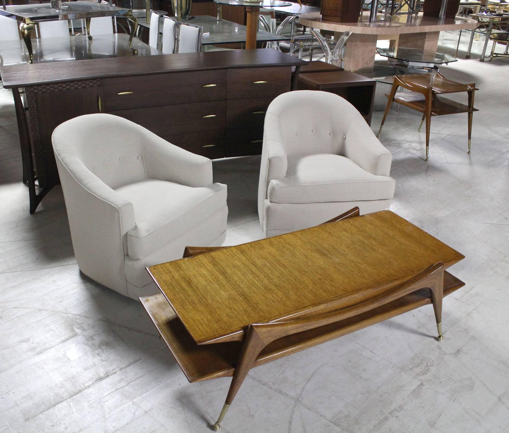 Newly upholstered mid century modern barrel back chairs from c.1970's.