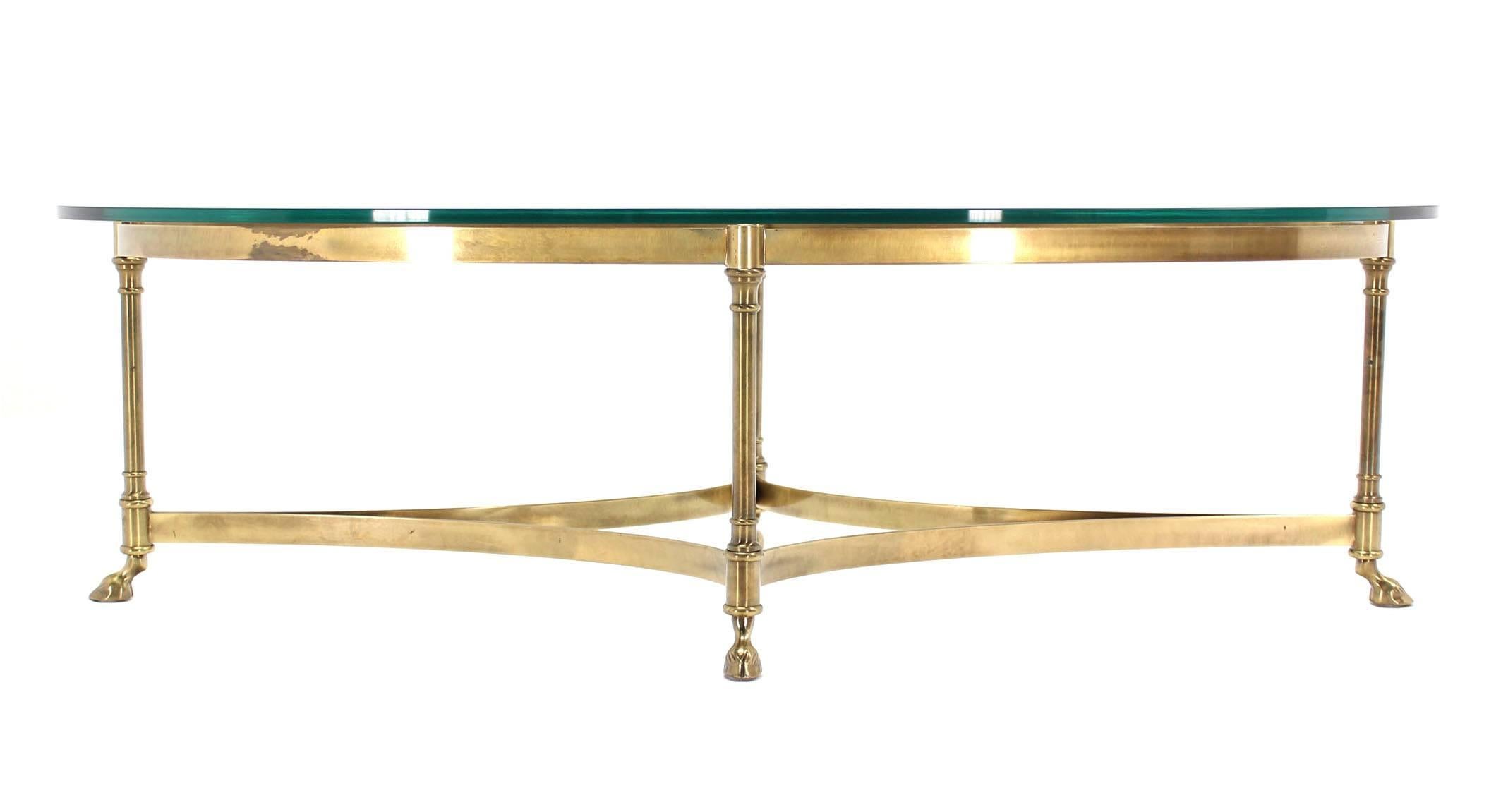 oval brass coffee table with glass top