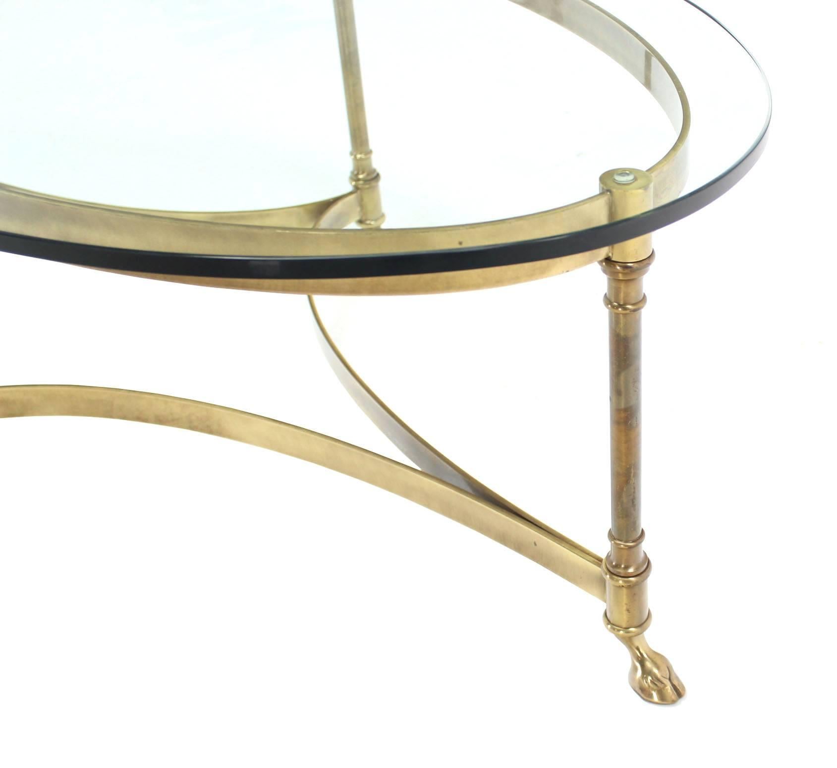 oval glass and brass coffee table